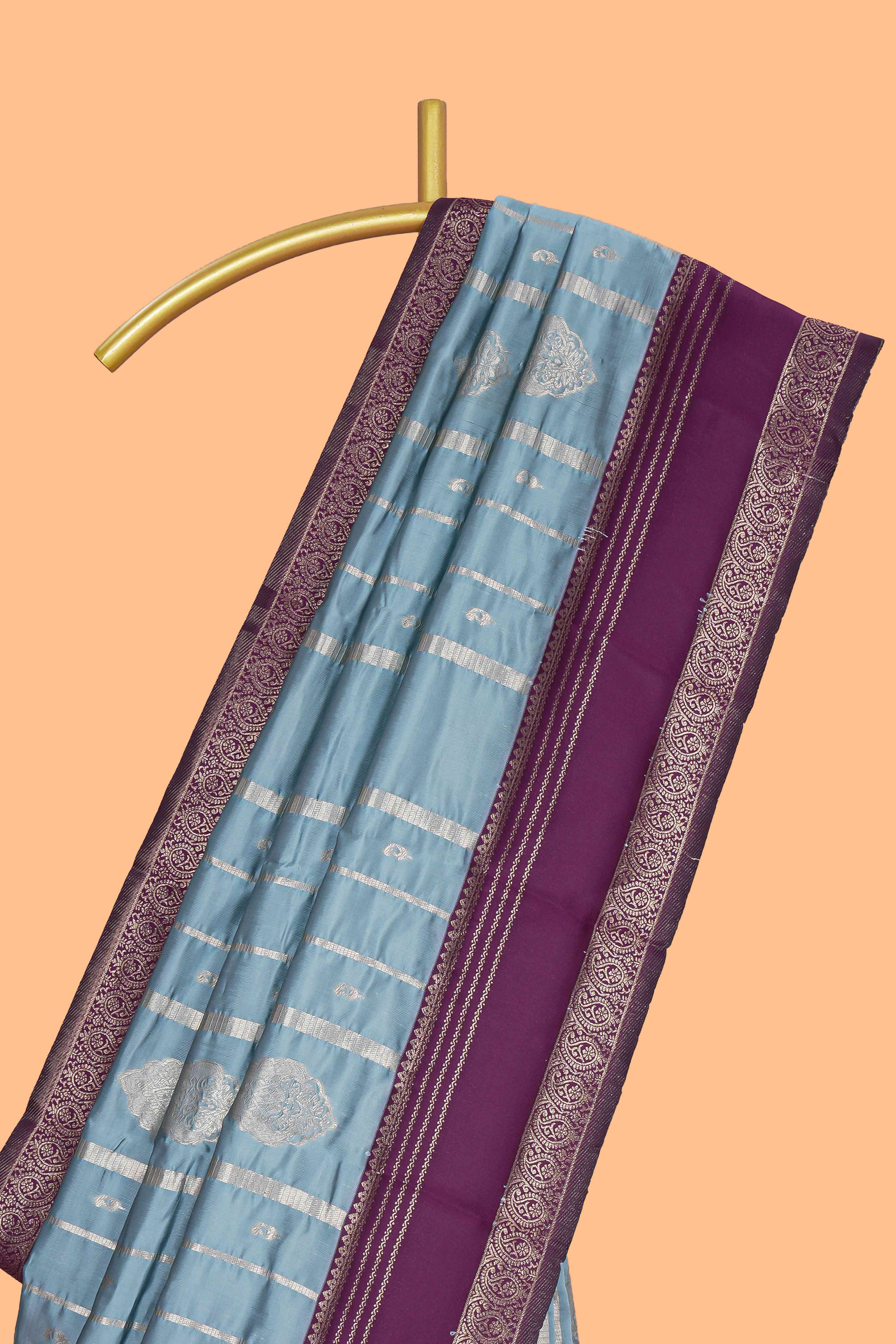Light blue striped zari motifs design kota cotton saree with contrast zari border and motifs blouse