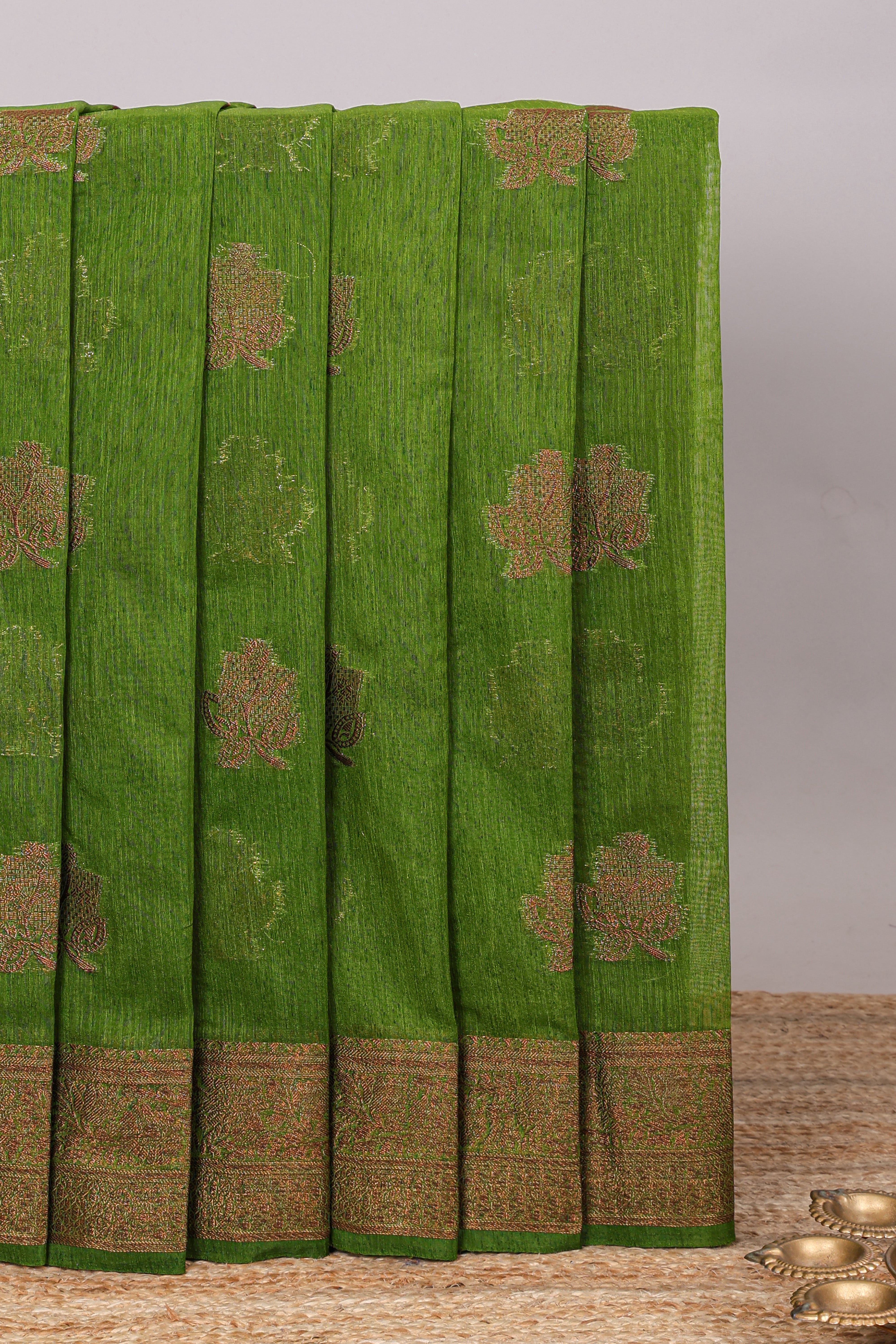 Green geometric zari motifs design kota cotton saree with self zari border and matching blouse