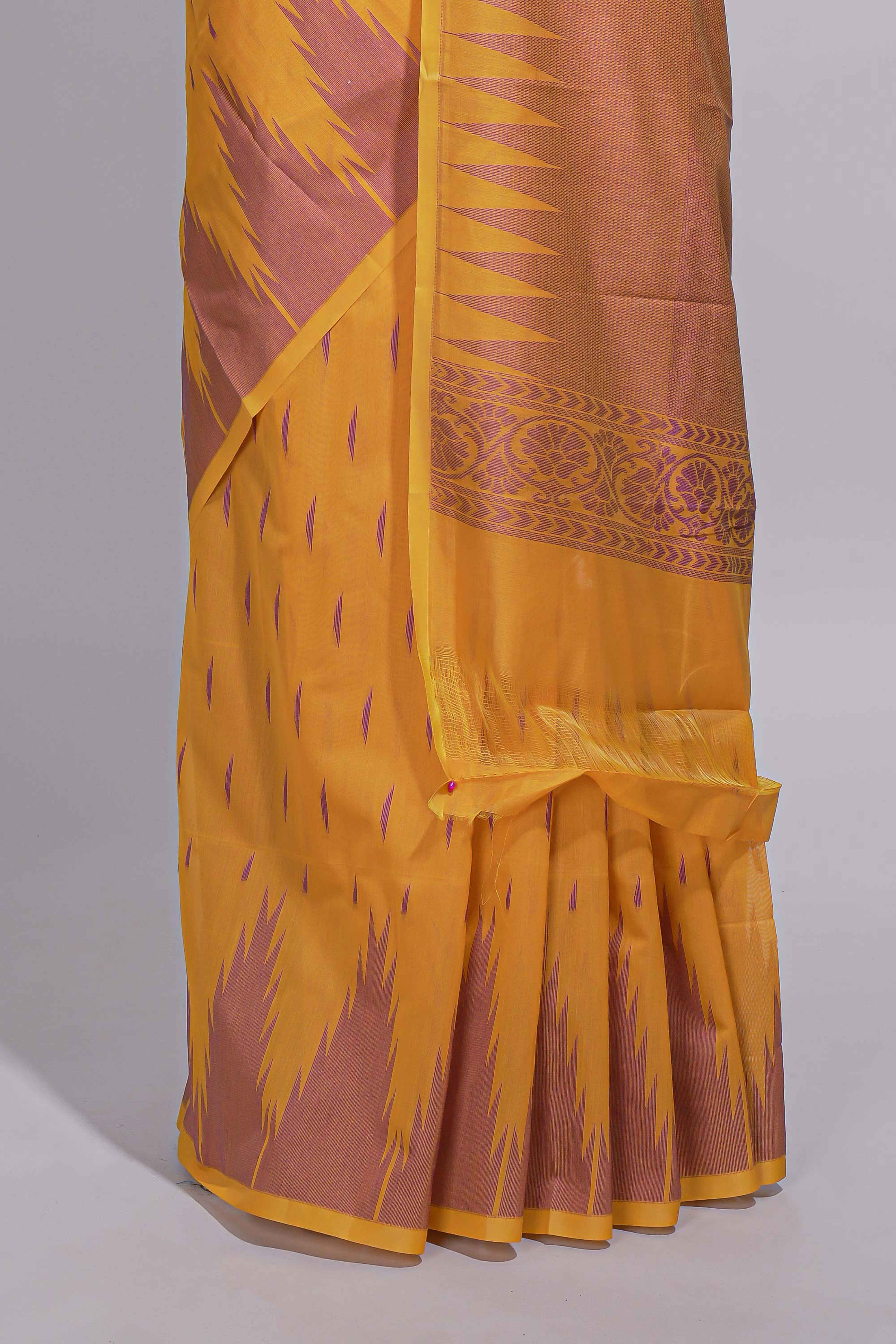 Yellow kota cotton saree with gold zari buttas a zari border with temple design and zari woven pallu with matching blouse piece