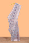 Powder blue floral motifs design kota cotton saree with self zari border and contrast blouse