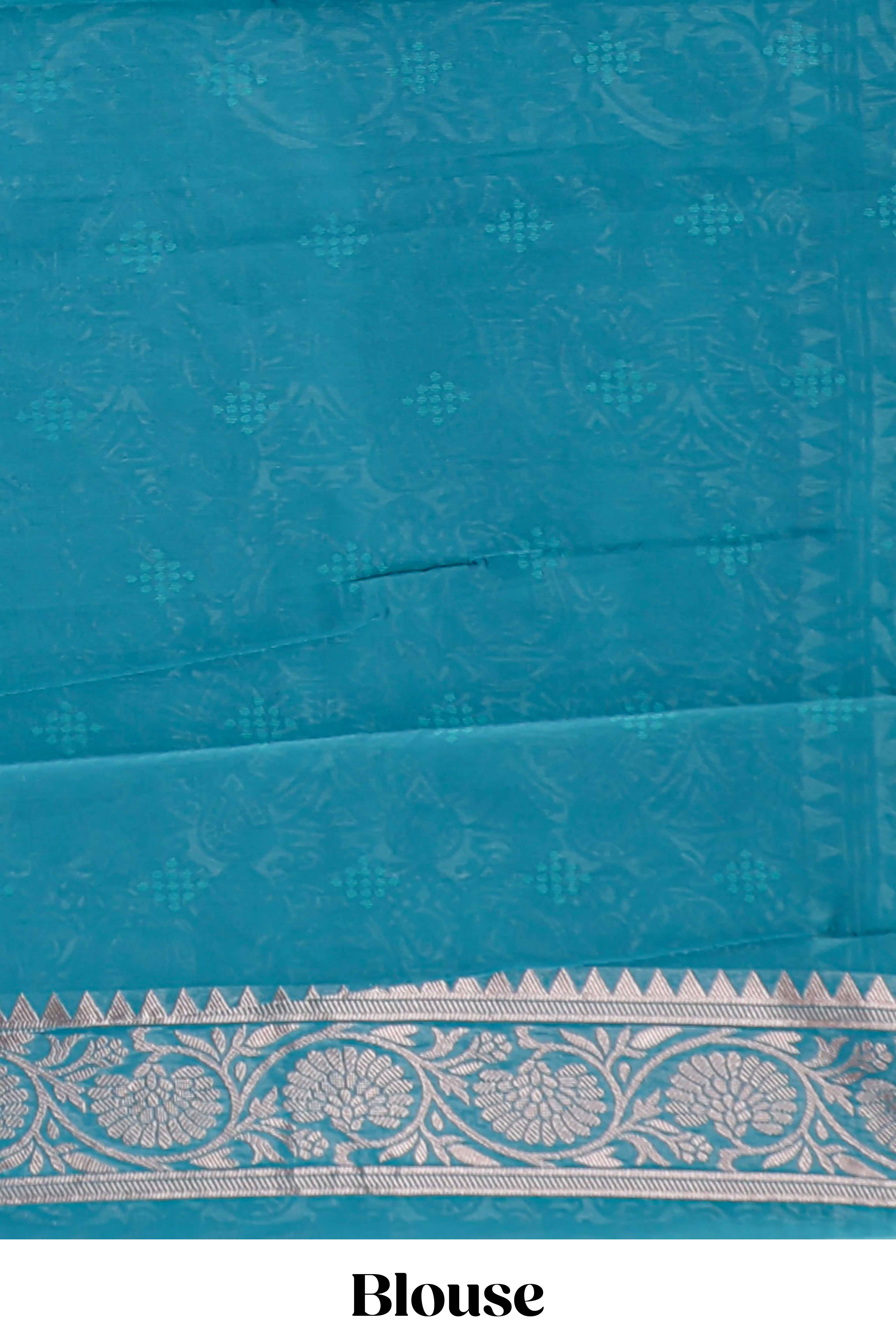 Powder blue floral motifs design kota cotton saree with self zari border and contrast blouse