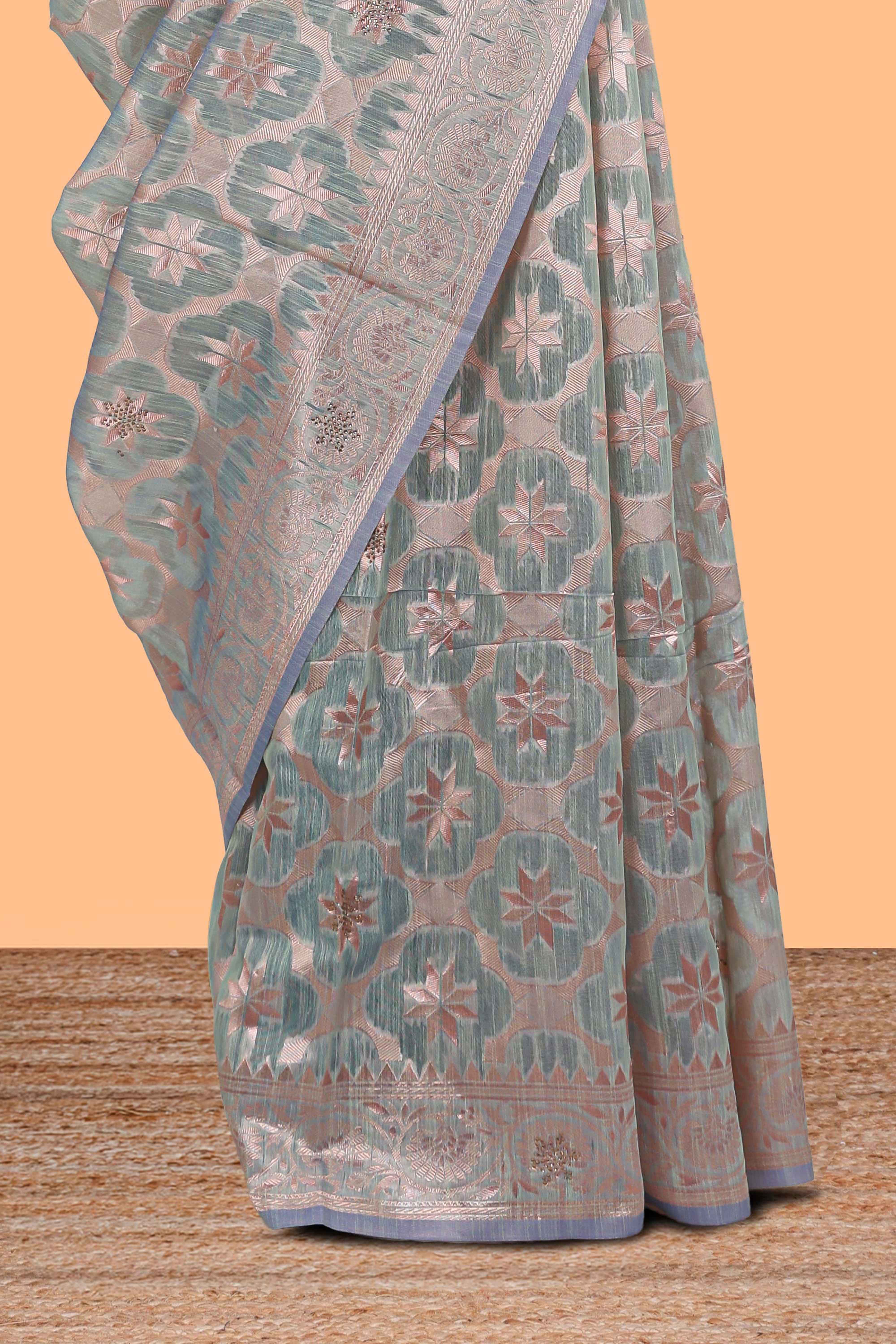 Powder green floral motifs design kota cotton saree with self zari border and contrast blouse