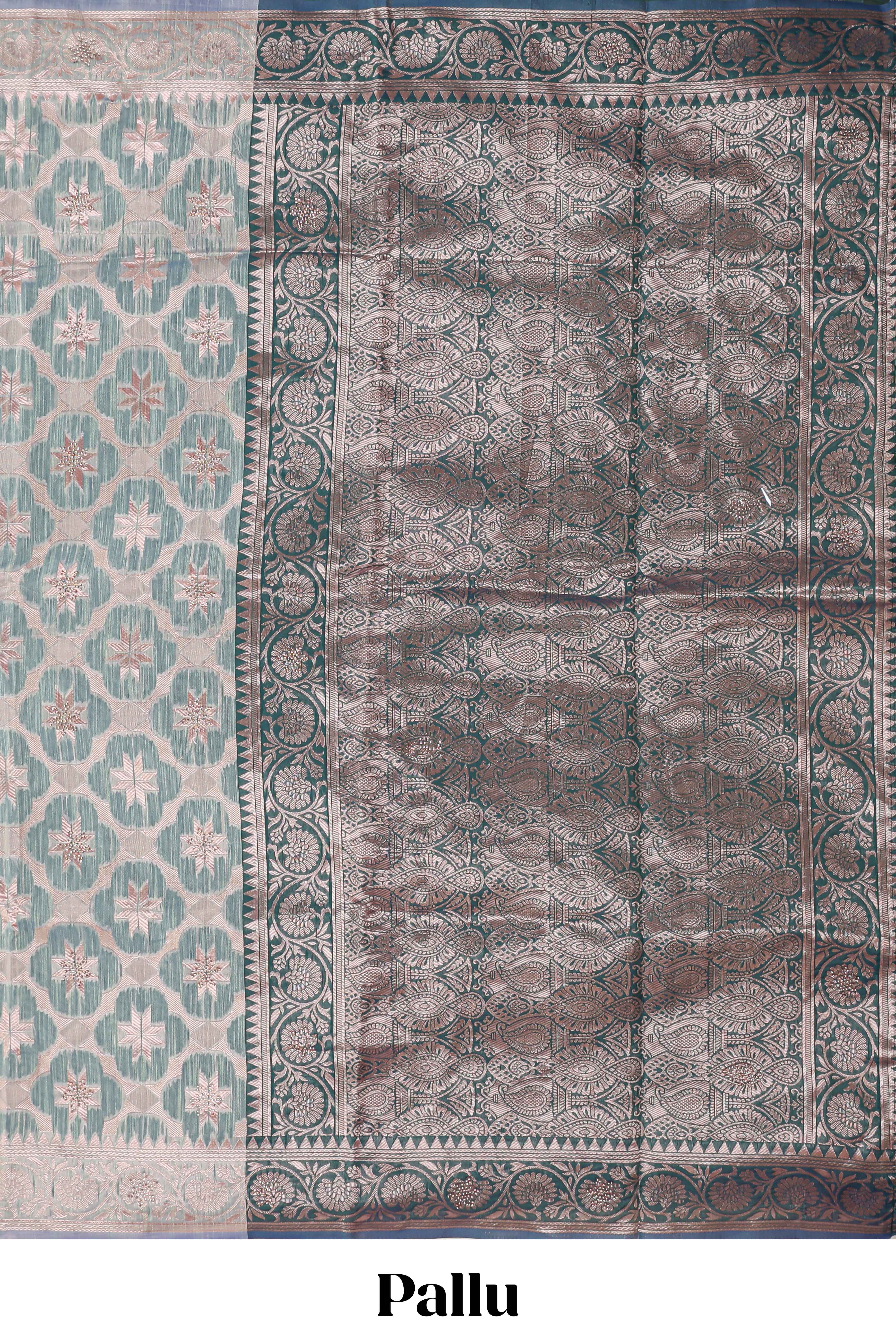Powder green floral motifs design kota cotton saree with self zari border and contrast blouse