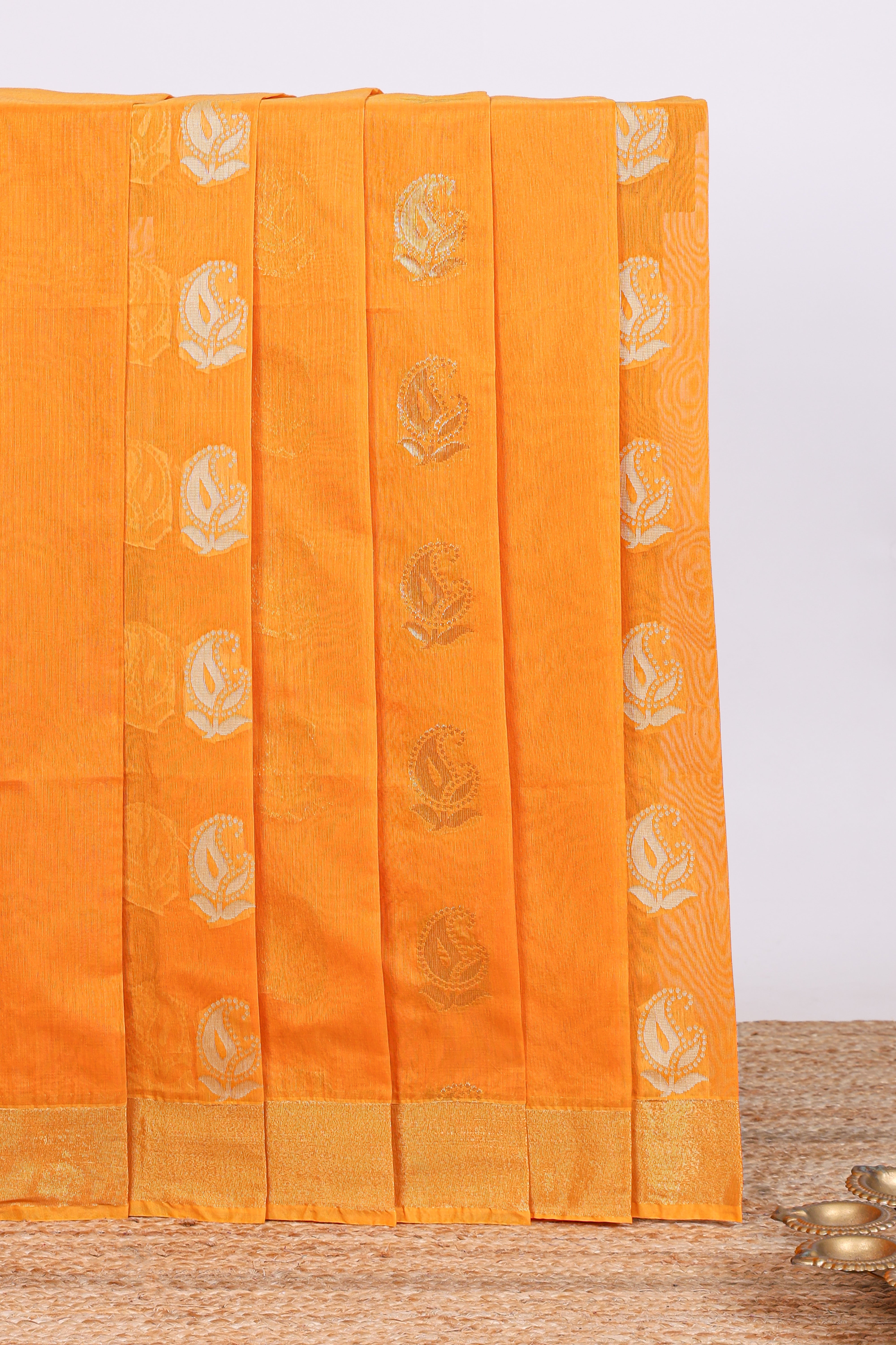 Bright Yellow floral zari motifs kota cotton saree with self zari border and contrast blouse