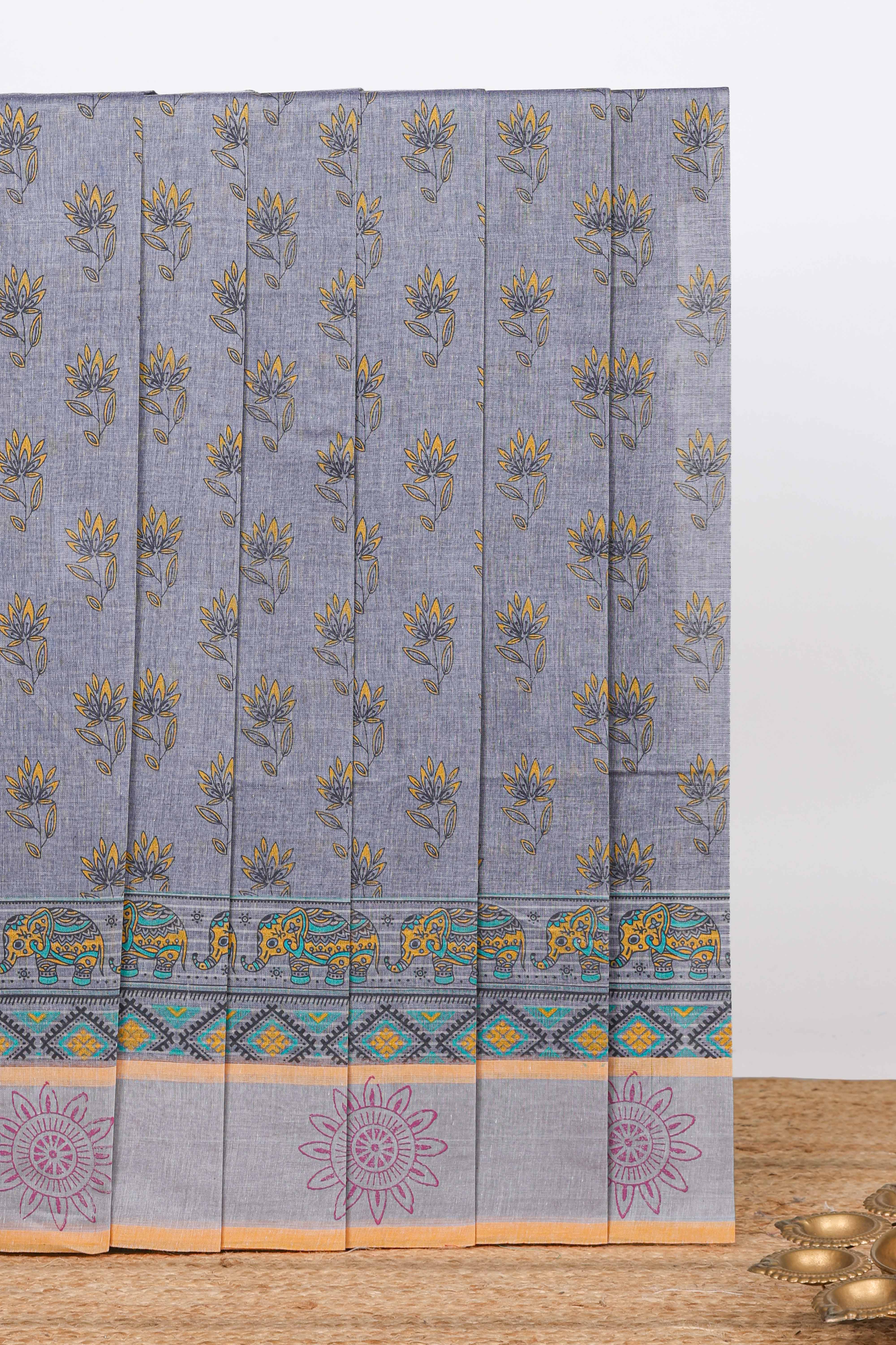 Grey floral design kovai cotton saree with self border and Contrast blouse