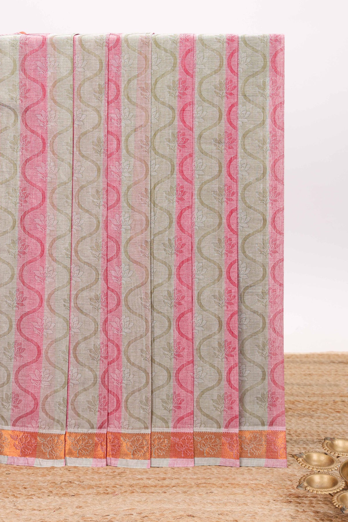 Pink and mint green floral designed kovai cotton saree with self border and matching blouse