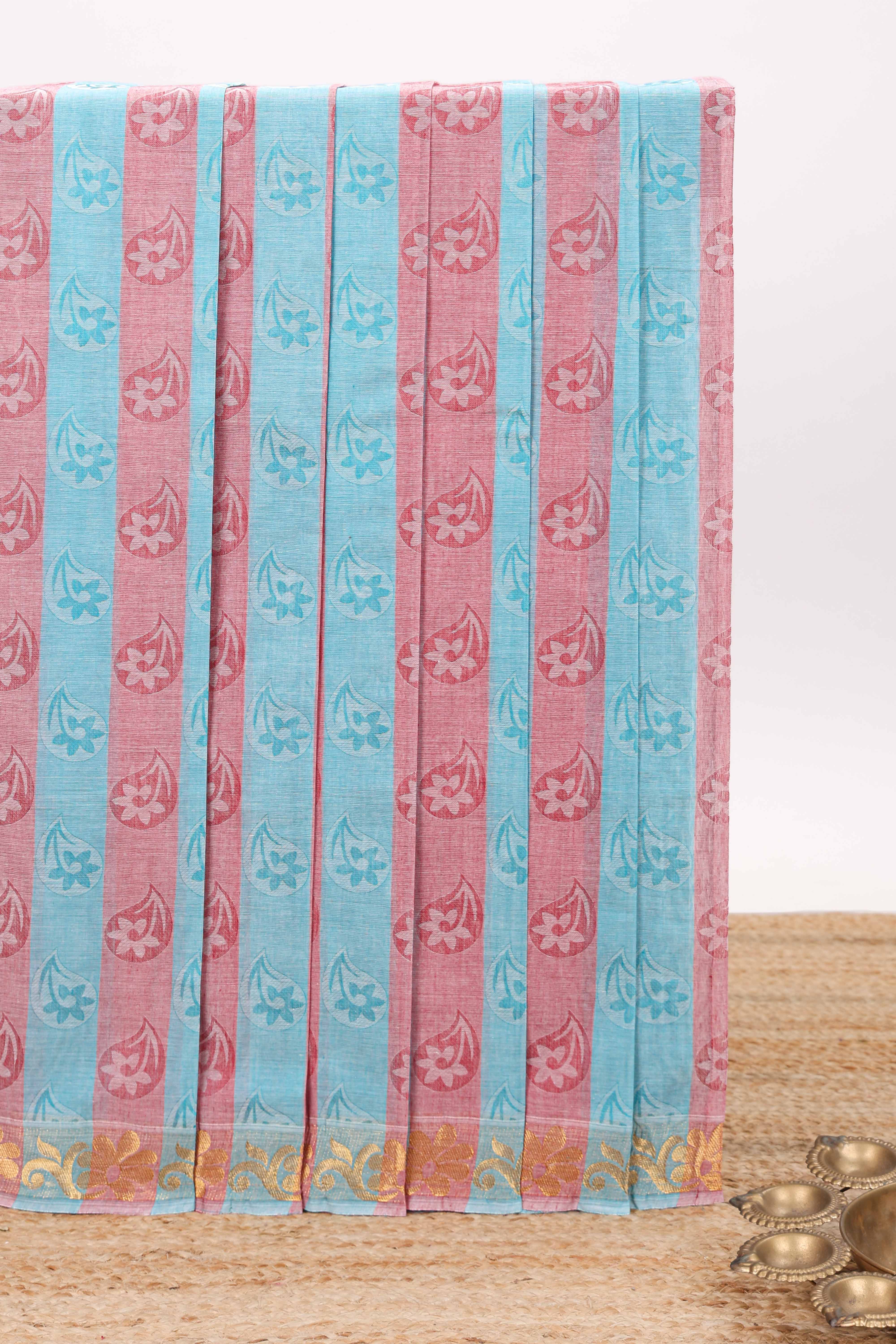 Peach and blue floral designed kovai cotton saree with self border and matching blouse