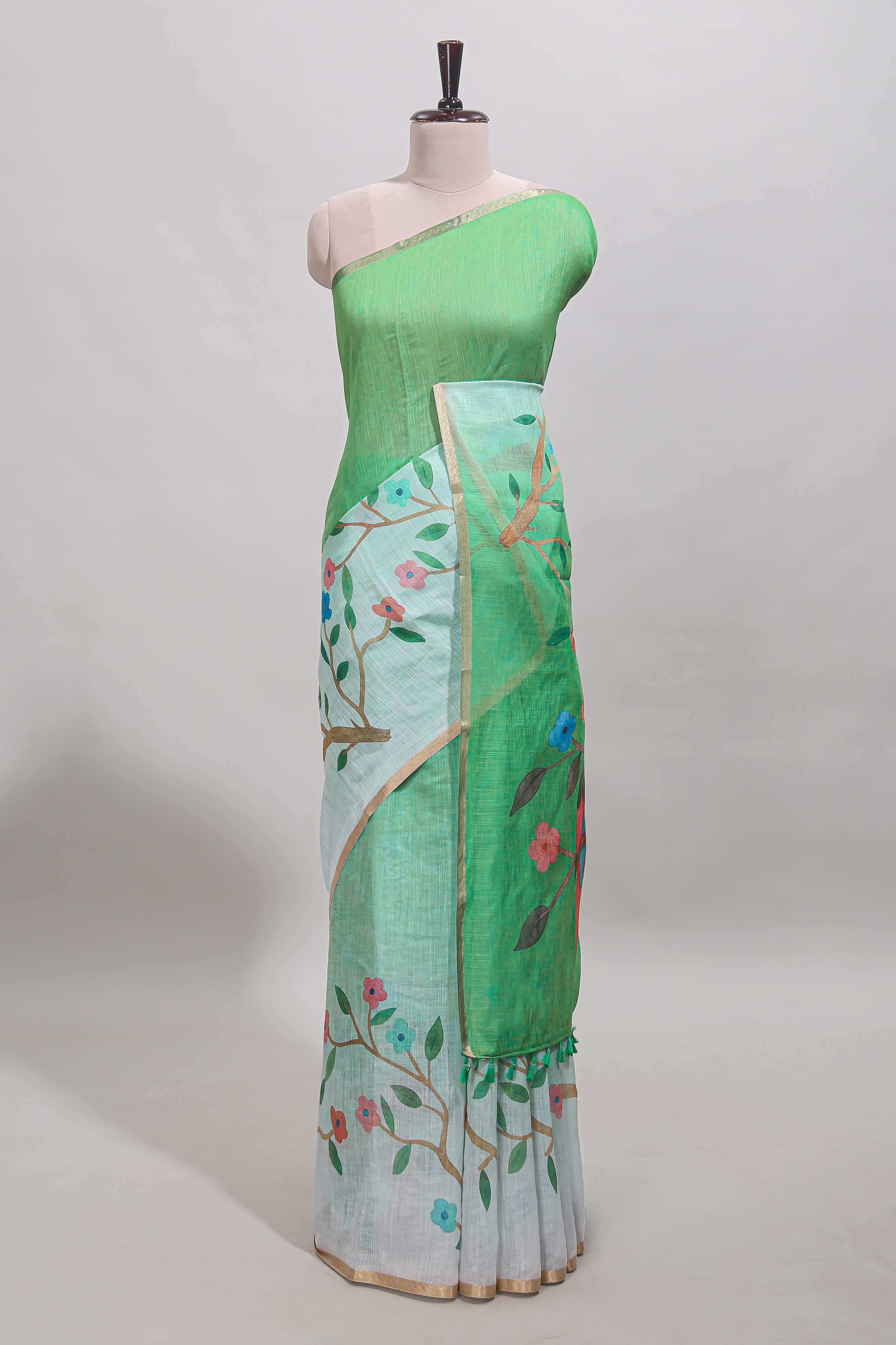 Green floral vines linen cotton saree with self zari border and matching blouse