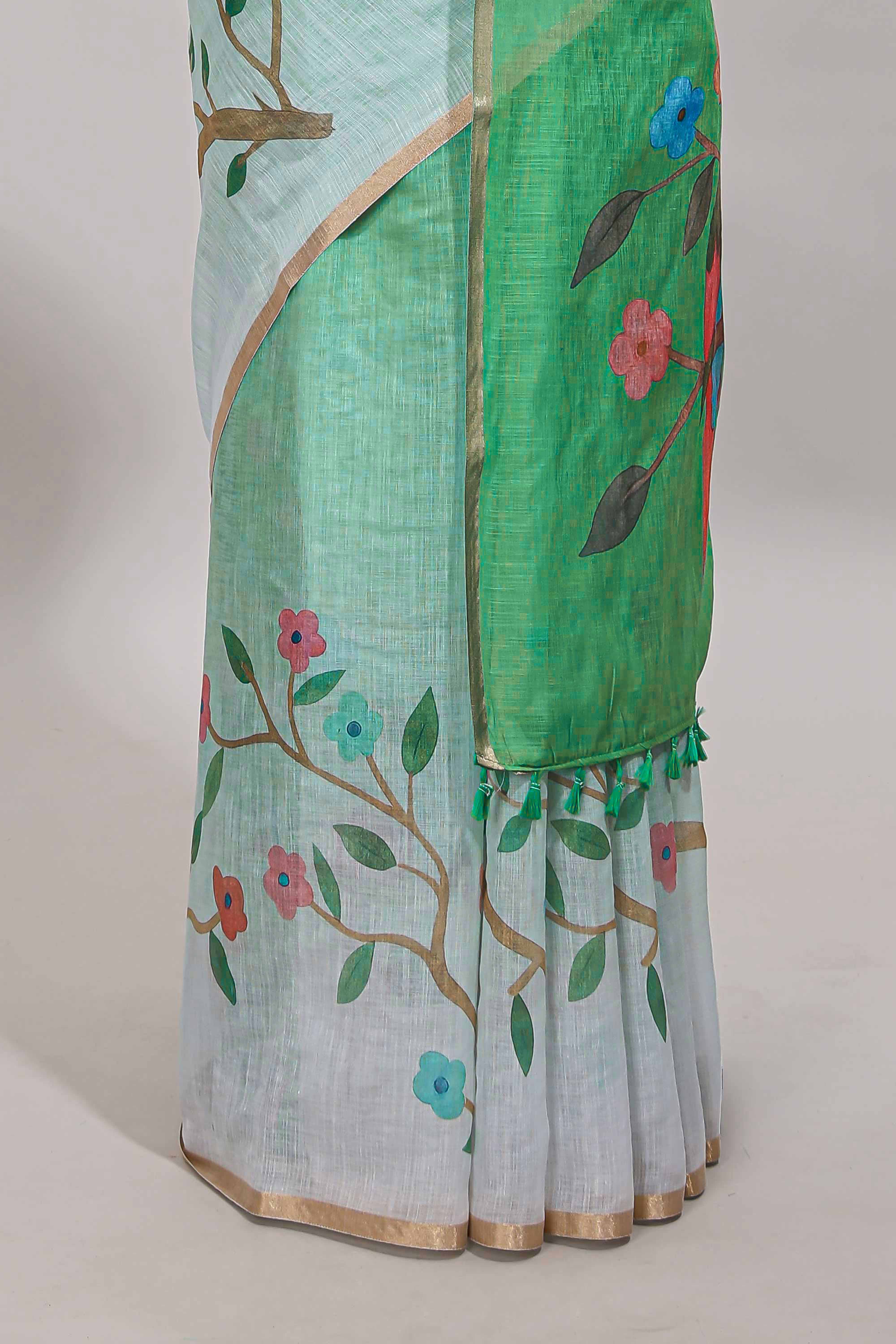 Green floral vines linen cotton saree with self zari border and matching blouse