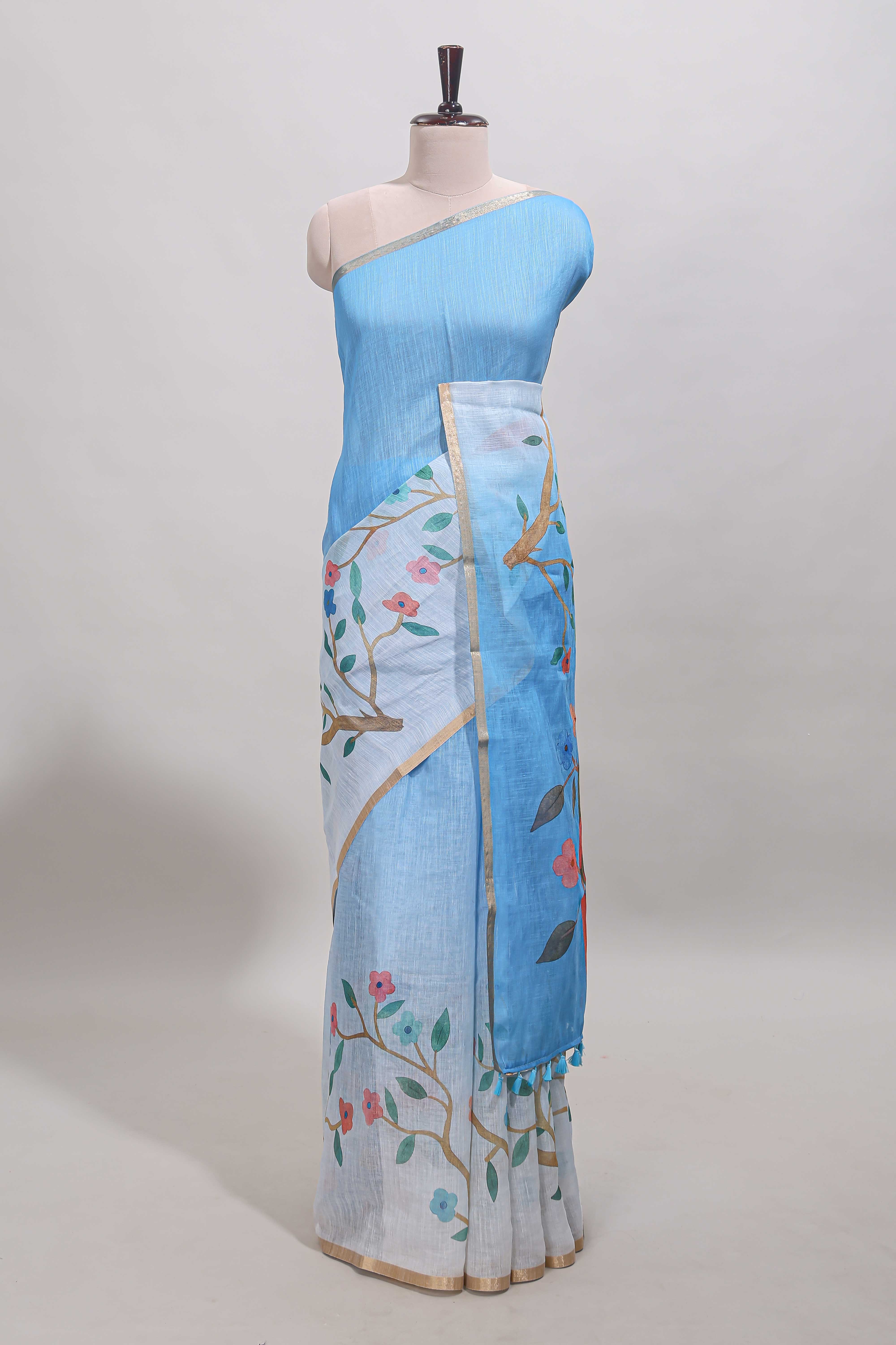 Blue floral vines linen cotton saree with self zari border and matching blouse