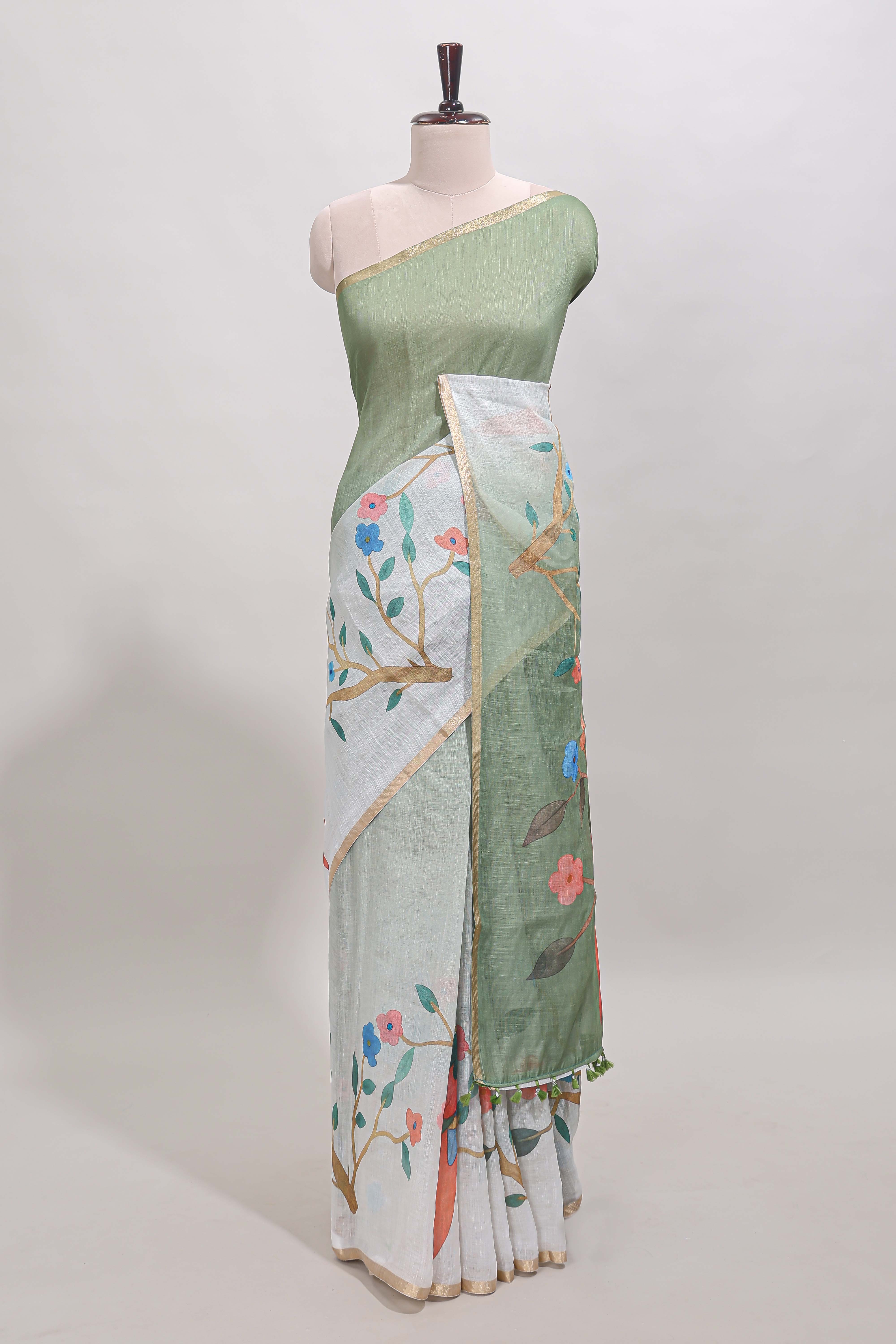 Green floral vines linen cotton saree with self zari border and matching blouse