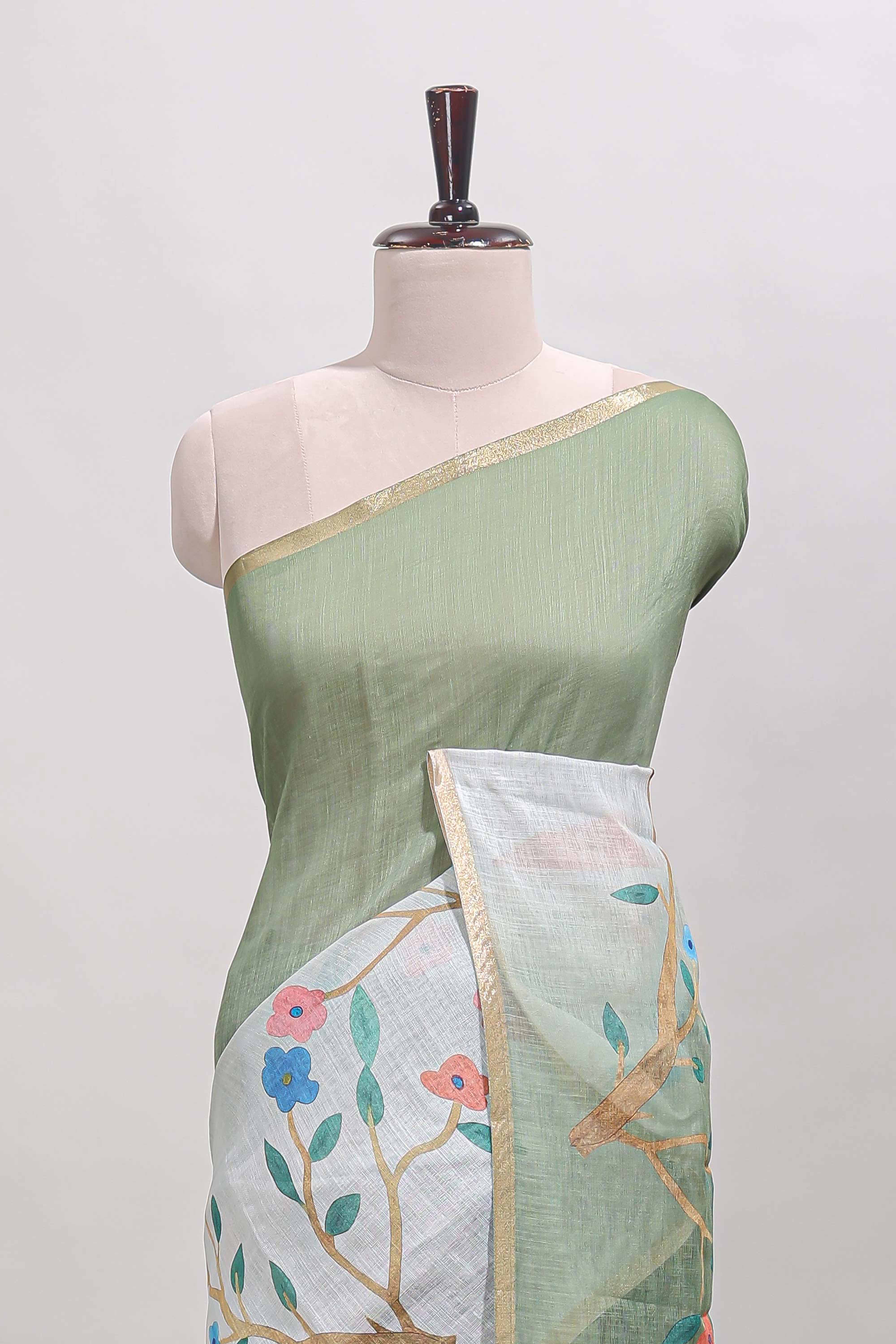 Green floral vines linen cotton saree with self zari border and matching blouse