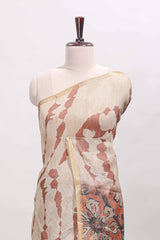 Beige linen cotton saree with brown shibori print, self zari border and floral design pallu