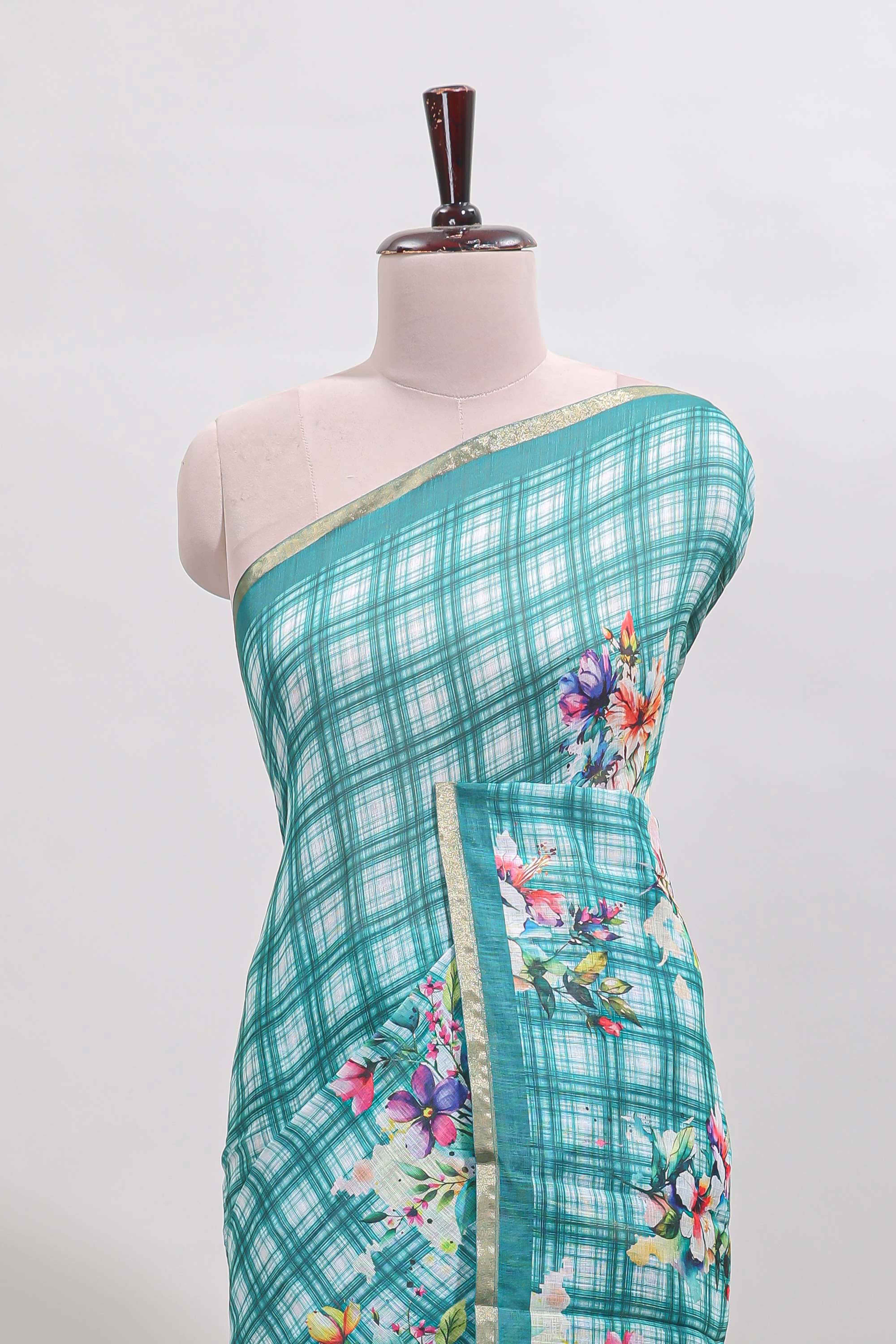 Teal green checked floral motifs linen cotton saree with self zari border matching blouse