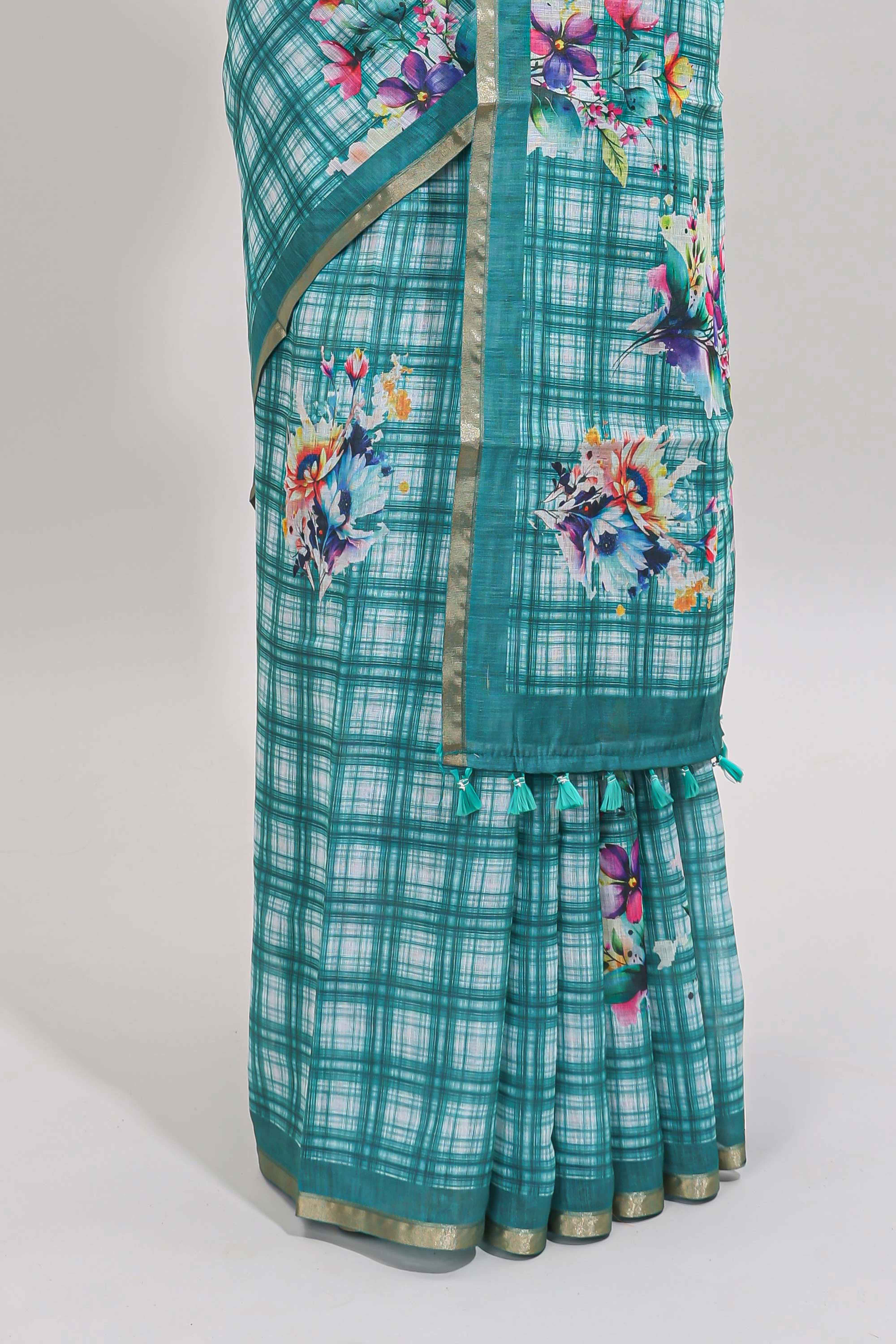 Teal green checked floral motifs linen cotton saree with self zari border matching blouse