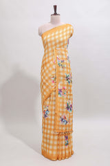 Yellow checked floral motifs linen cotton saree with self zari border matching blouse