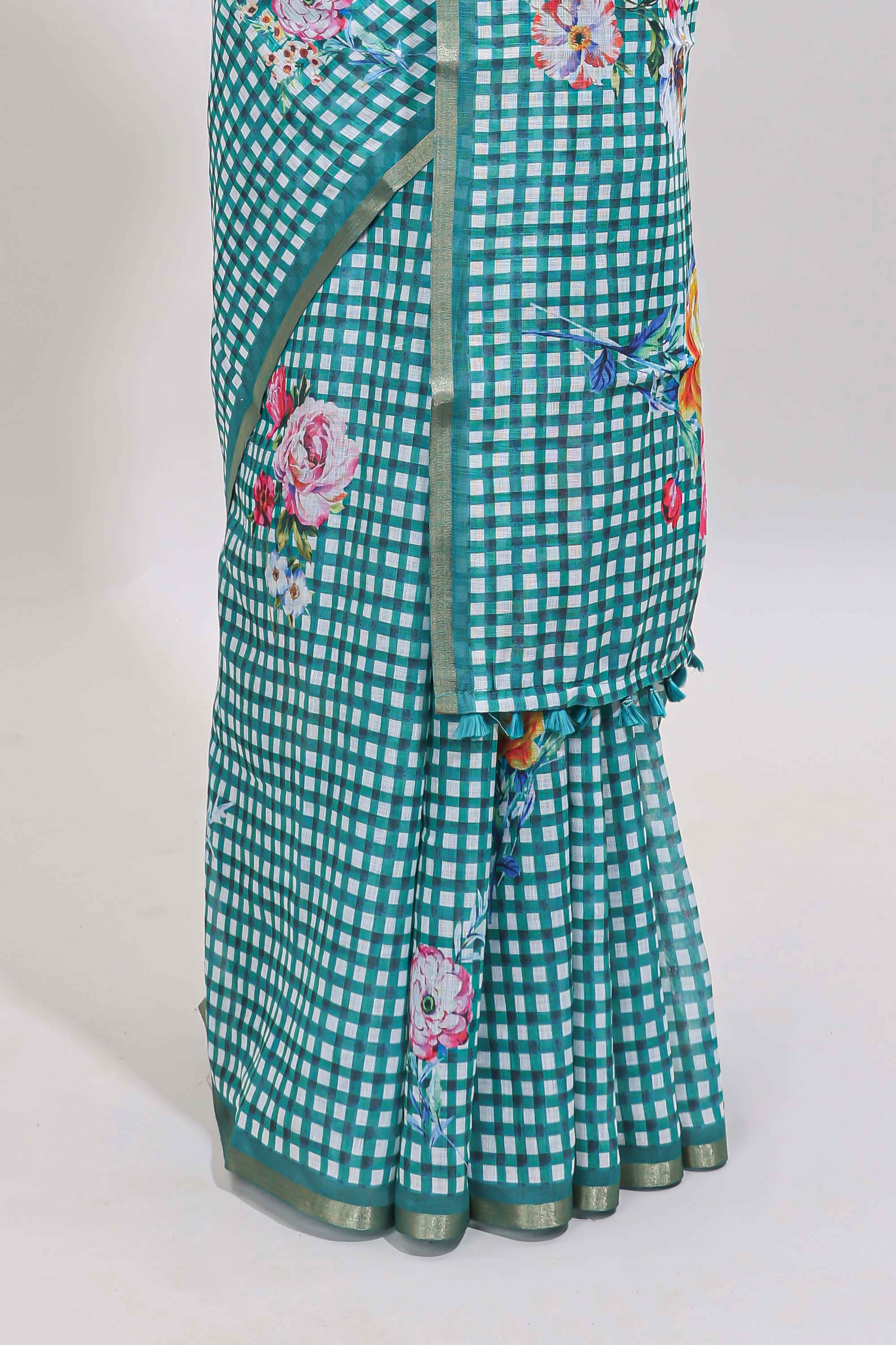 Green checked floral design linen cotton saree with self zari border and printed blouse