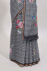 Grey checked floral design linen cotton saree with self zari border and printed blouse
