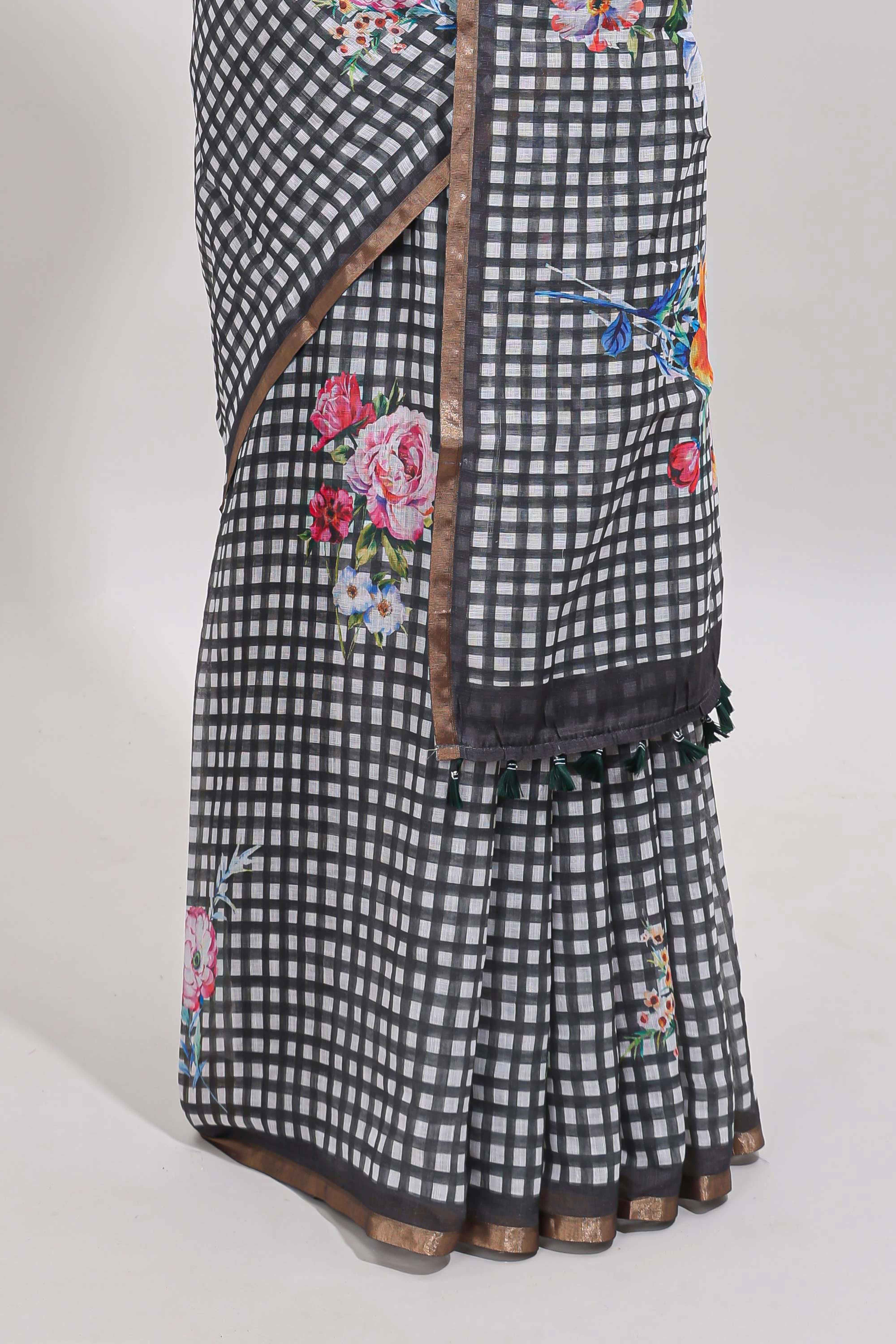 Grey checked floral design linen cotton saree with self zari border and printed blouse