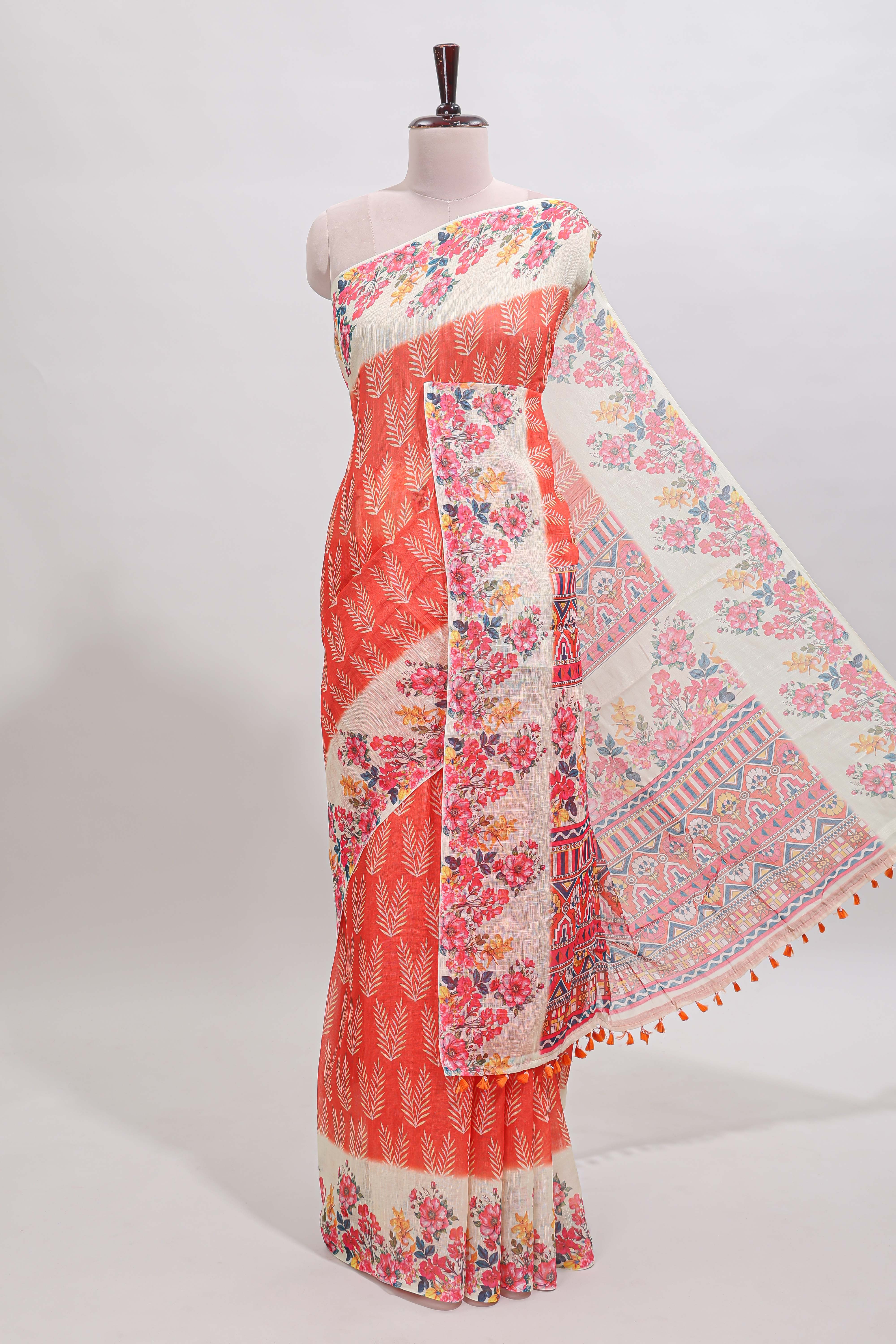 Orange leaf print linen cotton saree with contrast floral design border and matching blouse