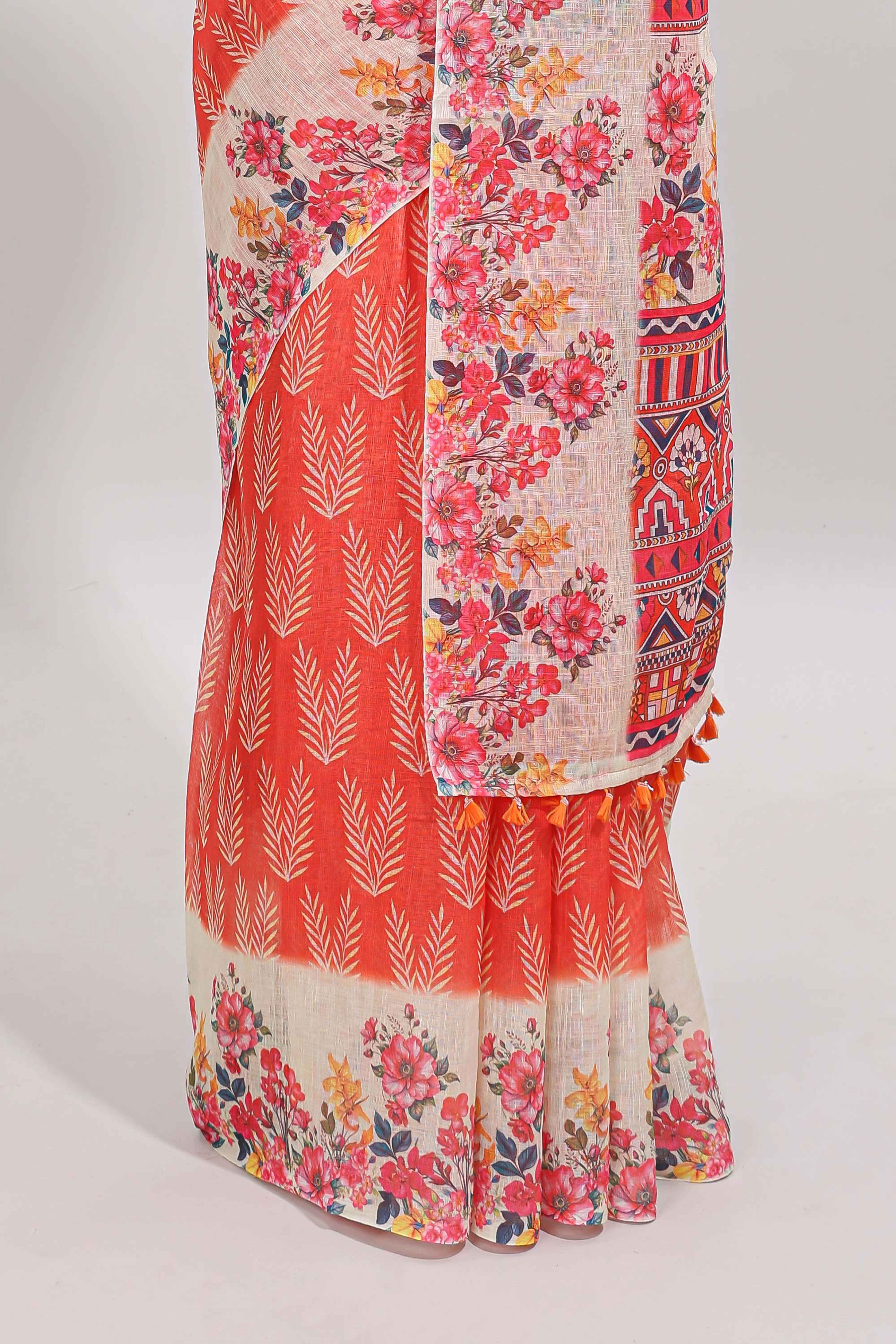 Orange leaf print linen cotton saree with contrast floral design border and matching blouse