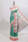 Green leaf print linen cotton saree with contrast floral design border and matching blouse