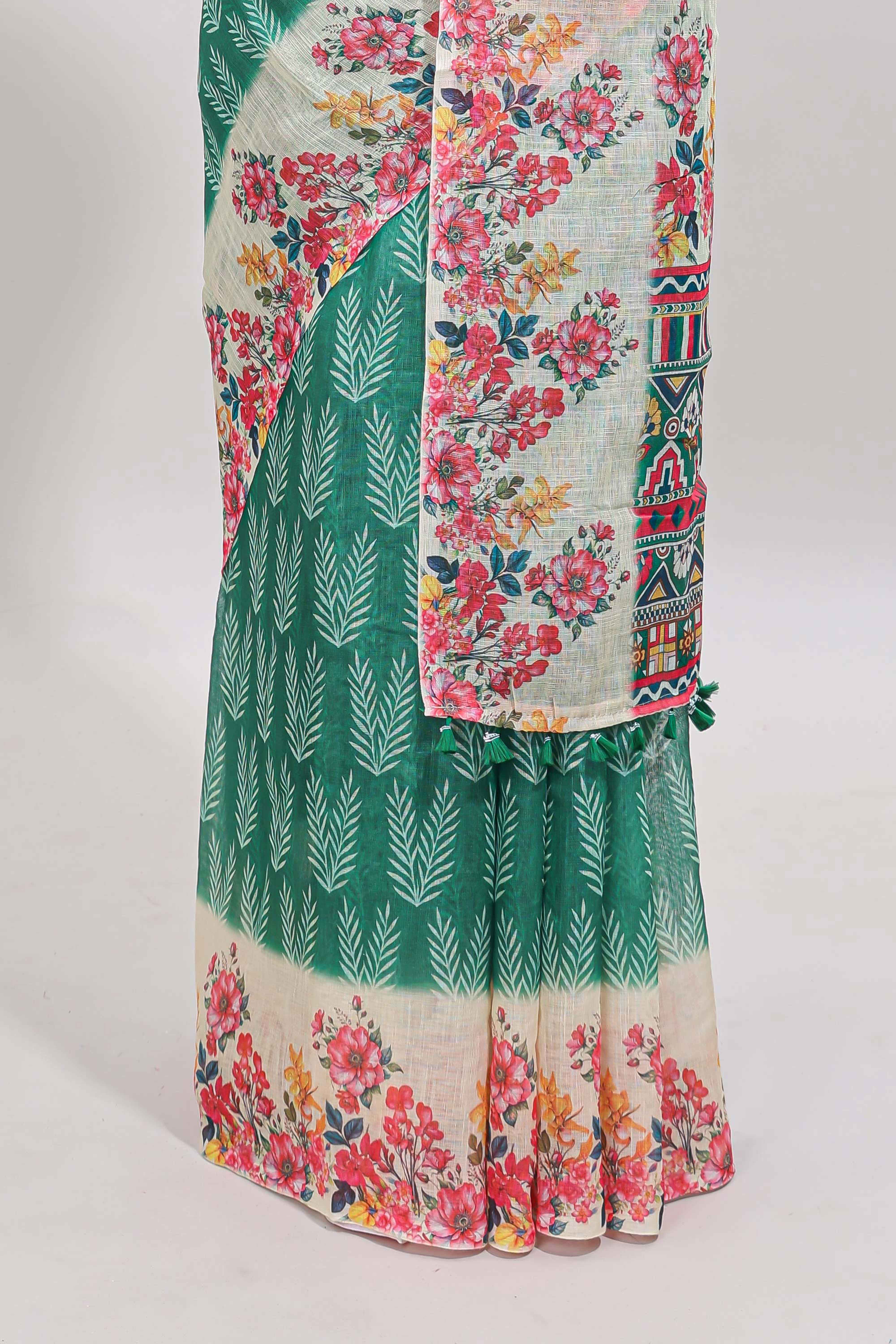Green leaf print linen cotton saree with contrast floral design border and matching blouse