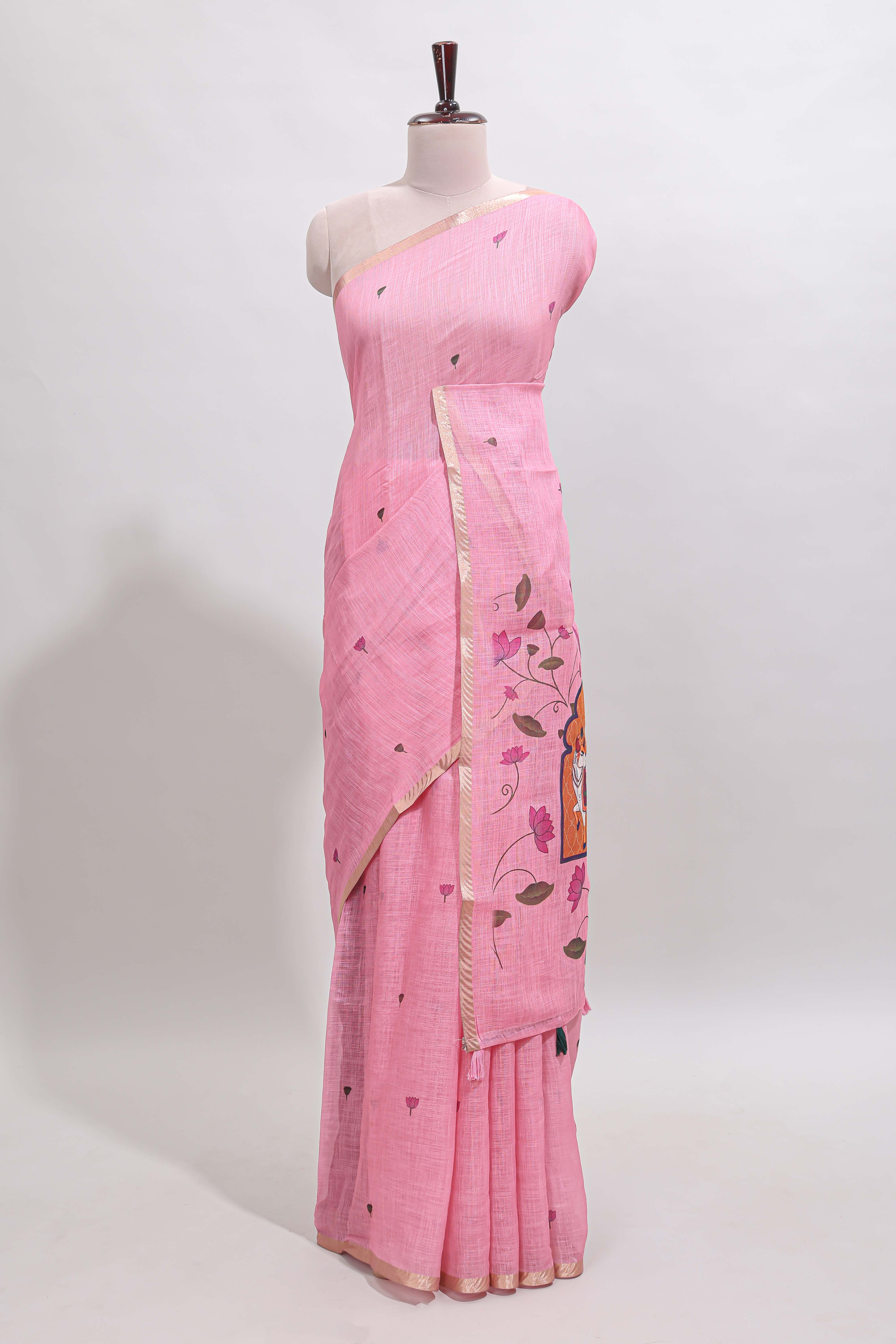 Pink floral design linen cotton saree with self zari border, matching pallu and contrast blouse