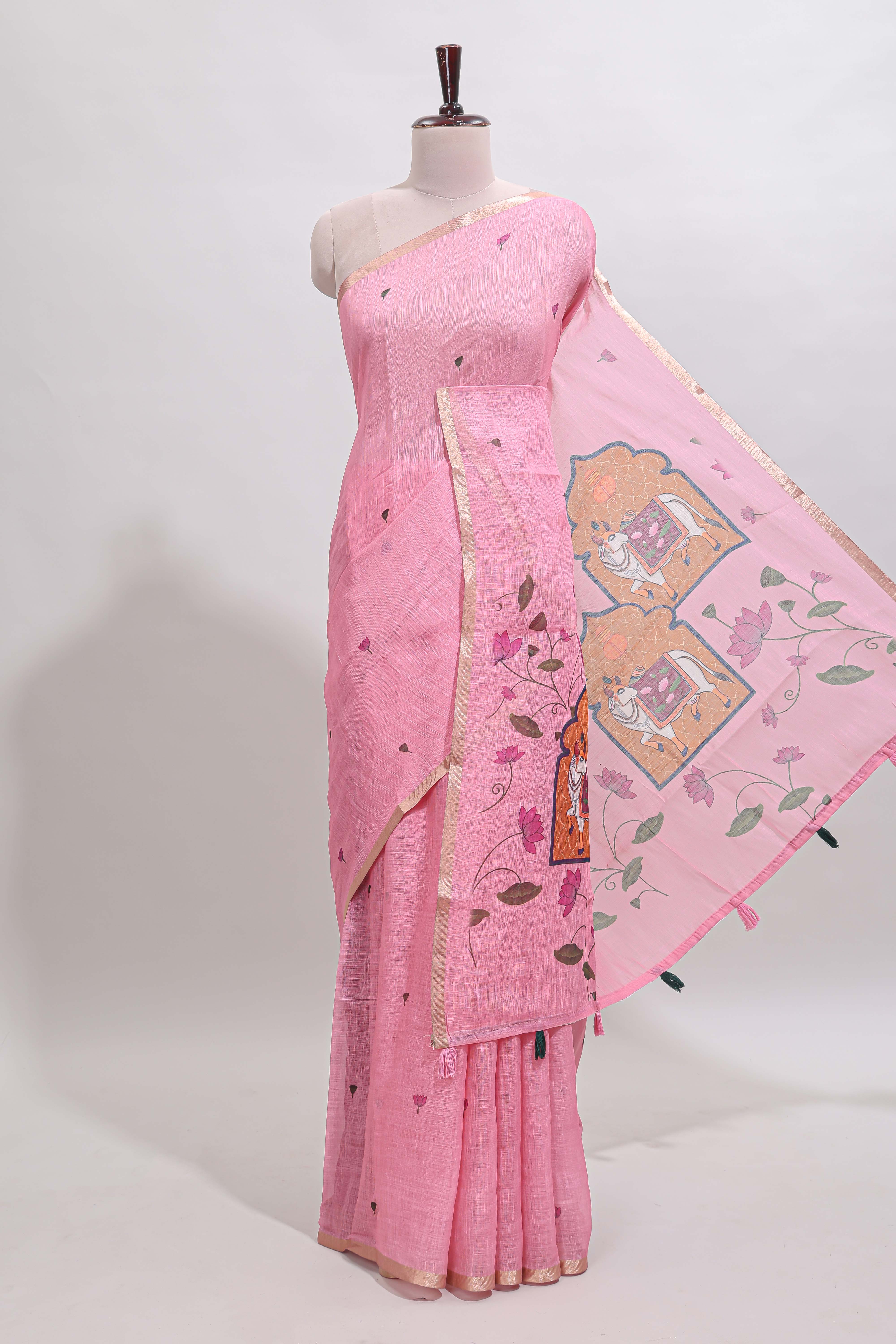 Pink floral design linen cotton saree with self zari border, matching pallu and contrast blouse