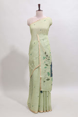 Green floral design linen cotton saree with self zari border, matching pallu and contrast blouse