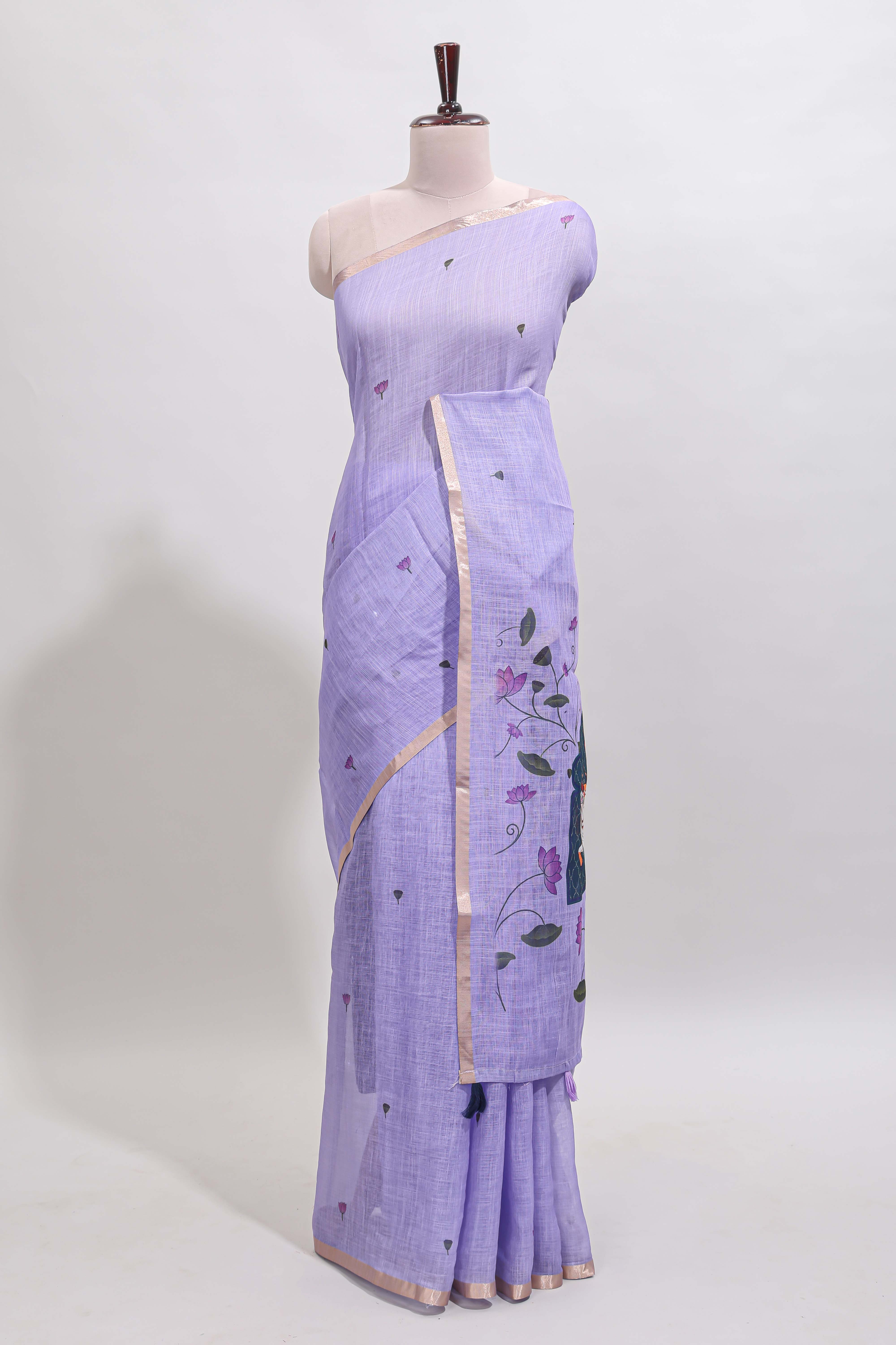 Lavender floral design linen cotton saree with self zari border, matching pallu and contrast blouse