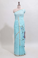 Blue floral design linen cotton saree with self zari border, matching pallu and contrast blouse