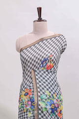 Grey checked floral design linen cotton saree with self zari border and matching blouse