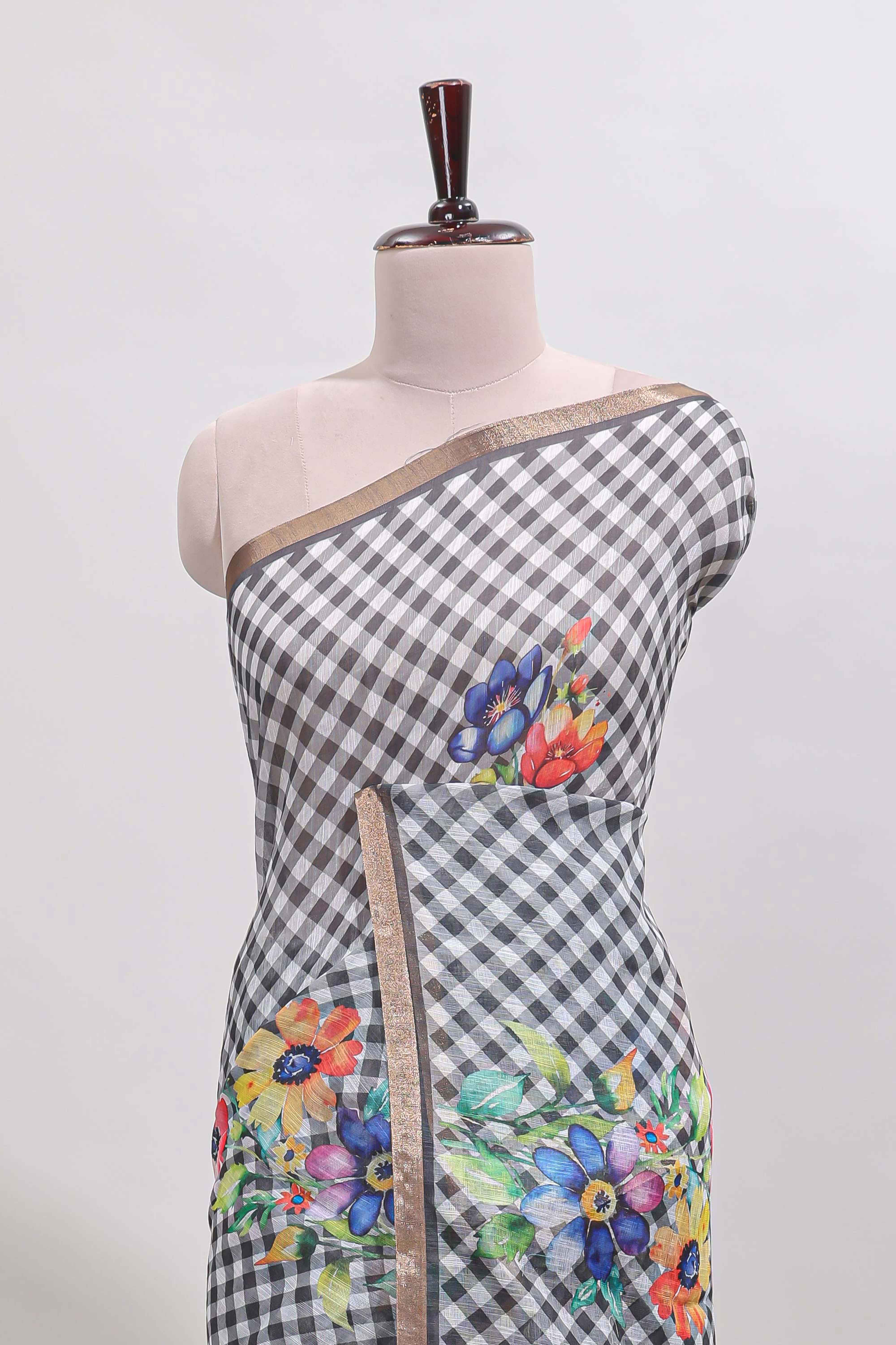 Grey checked floral design linen cotton saree with self zari border and matching blouse
