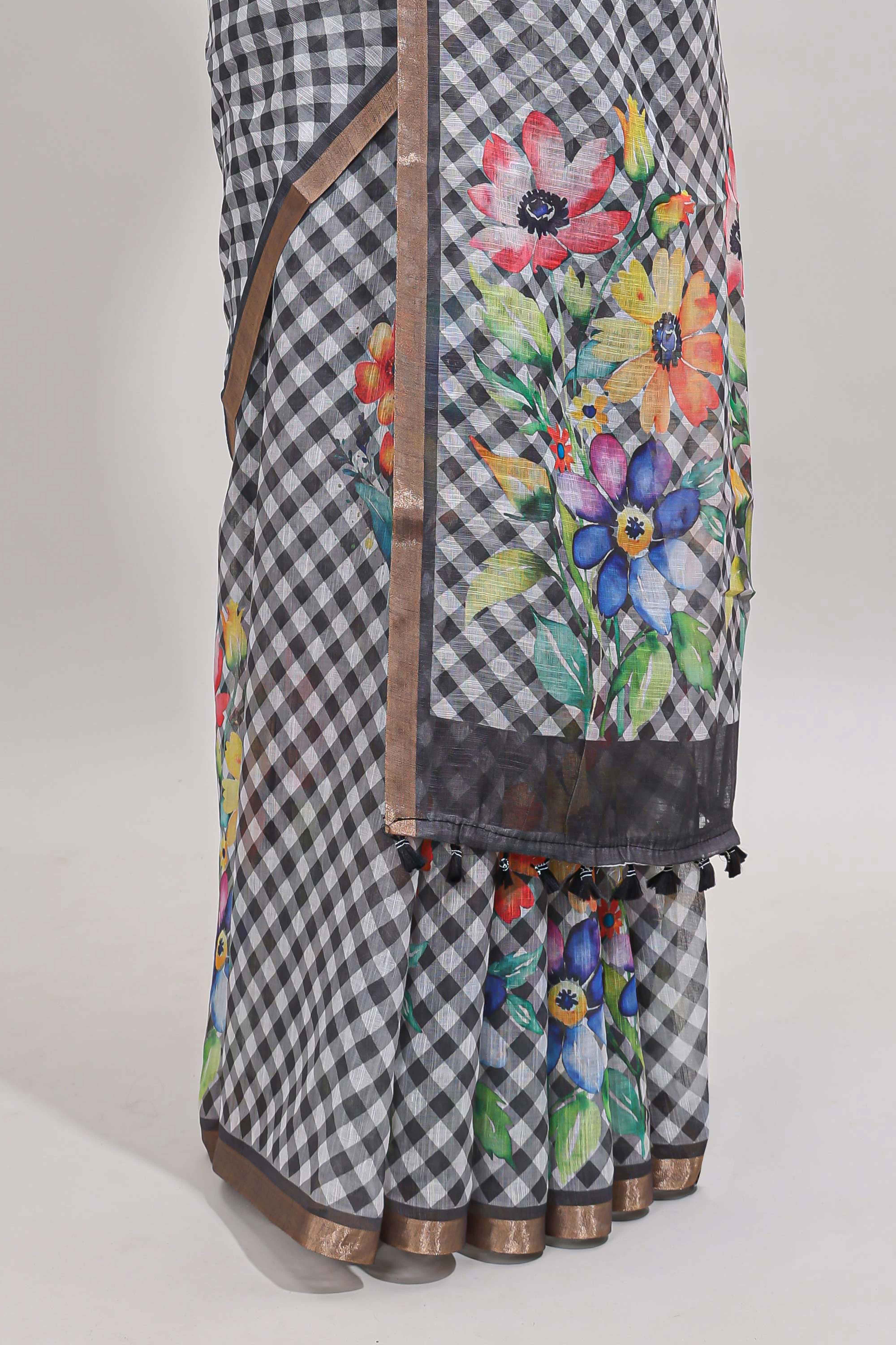 Grey checked floral design linen cotton saree with self zari border and matching blouse