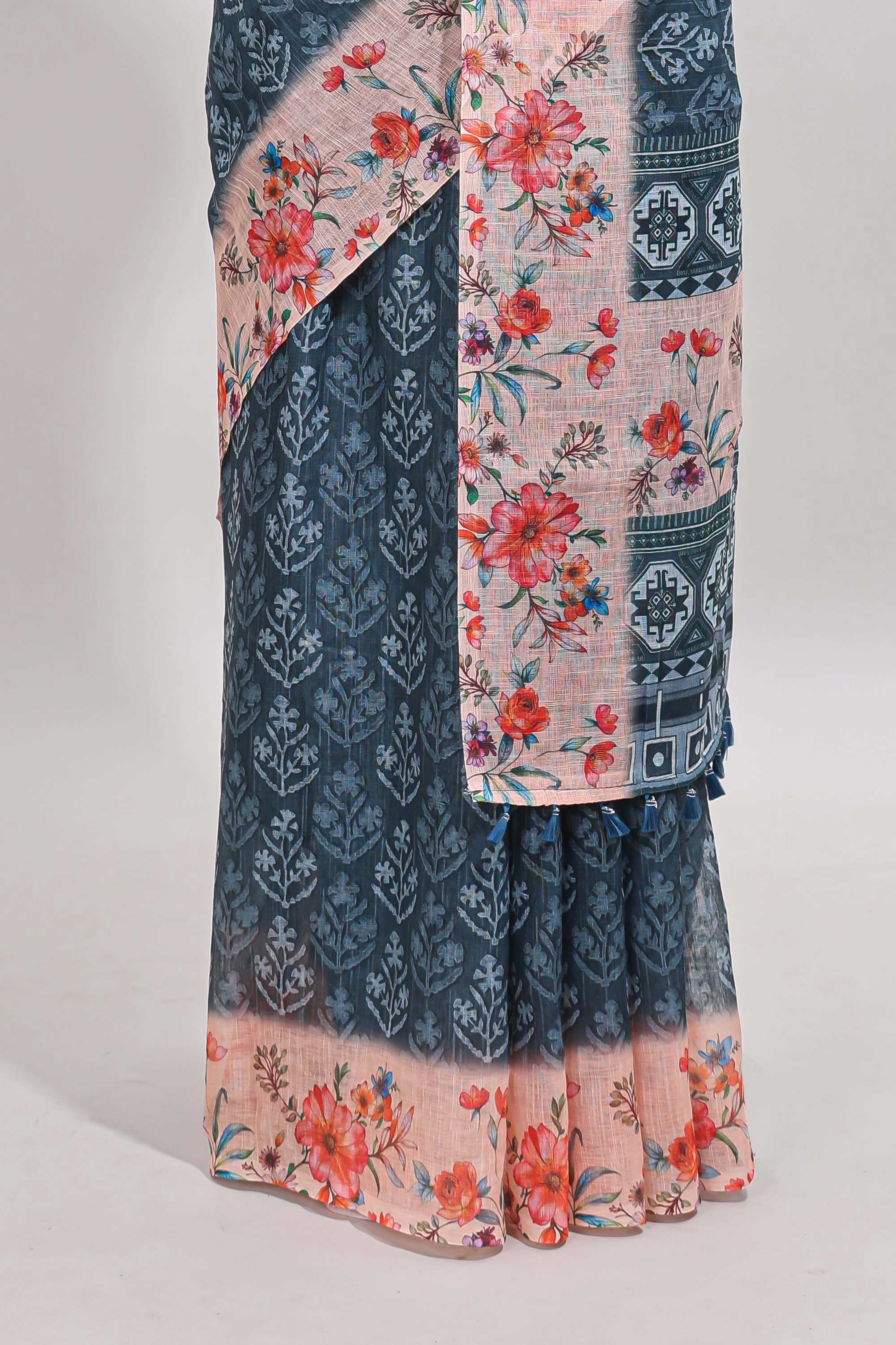Midnight green floral design linen cotton saree with contrast floral design border and matching blouse