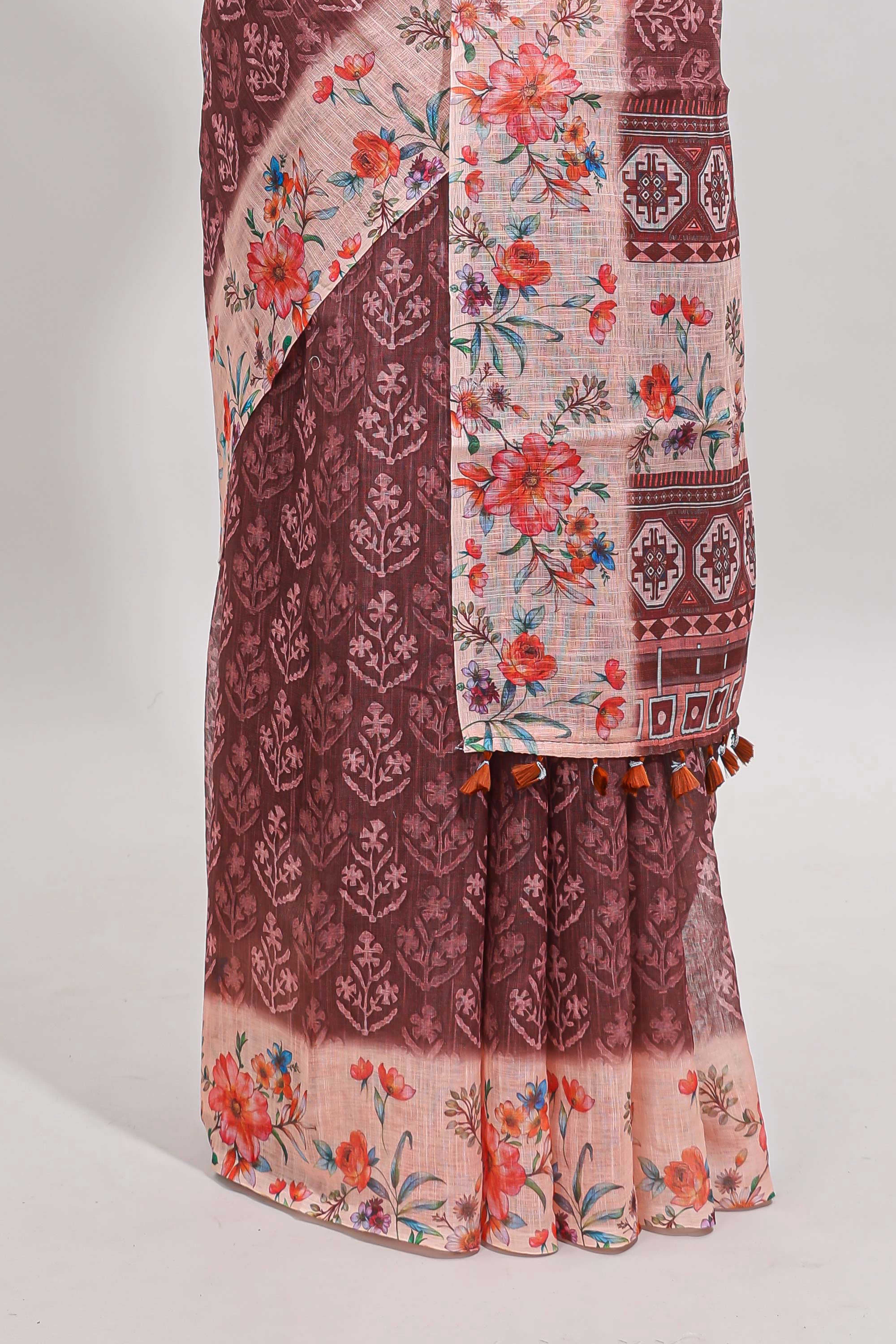 Brown floral design linen cotton saree with contrast floral design border and matching blouse