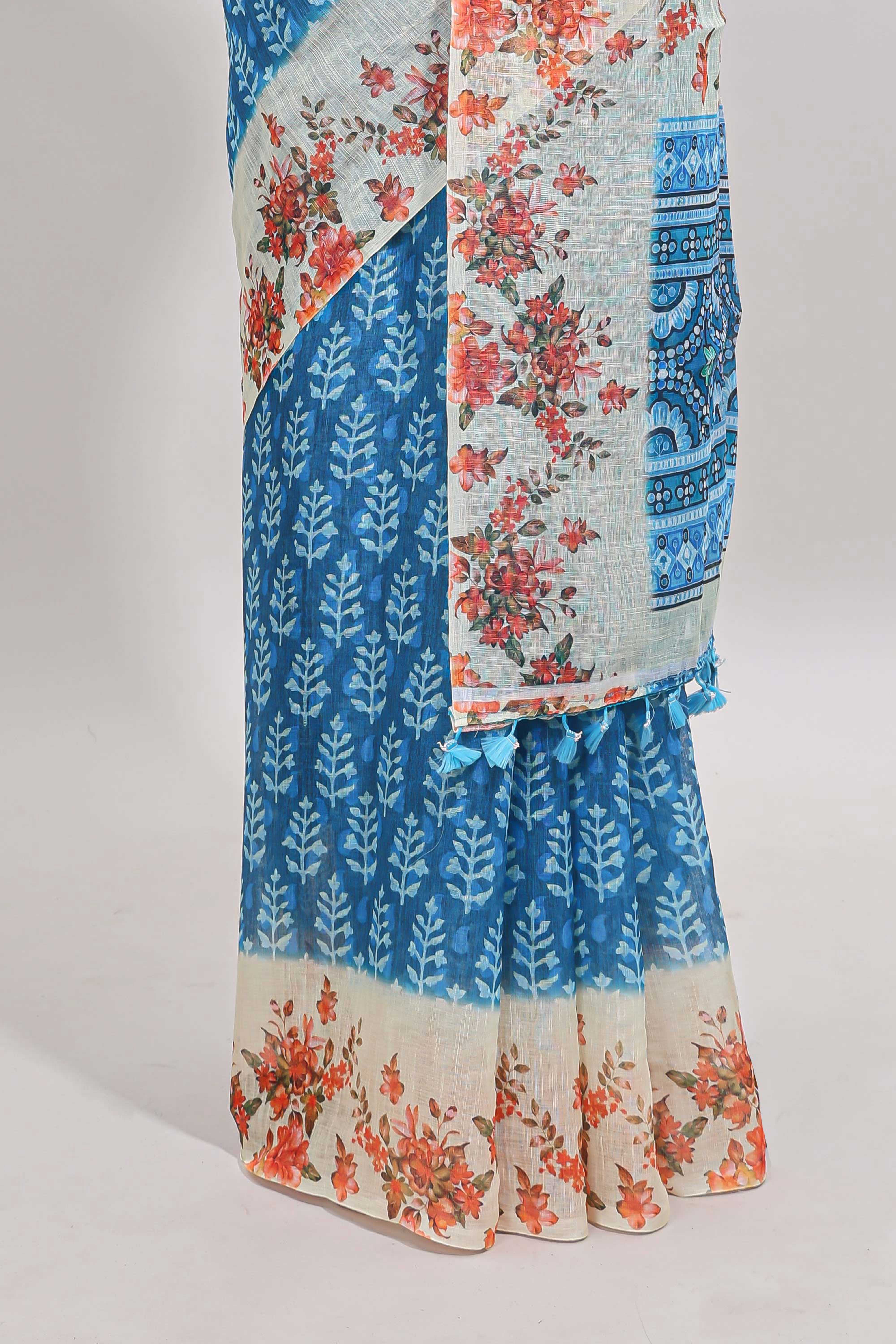 Blue leaf design linen cotton saree with contrast floral design border and matching blouse
