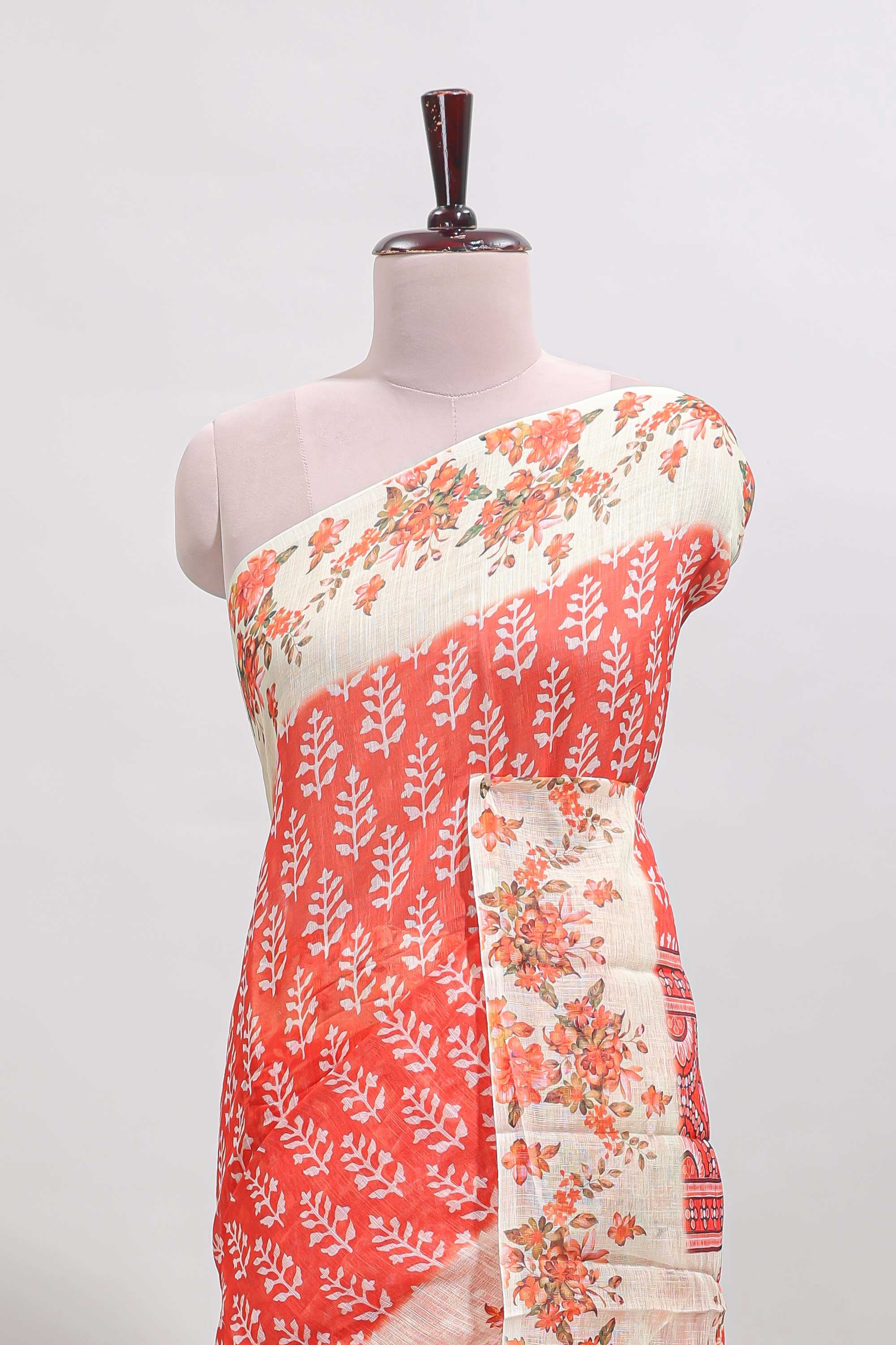 Orange leaf design linen cotton saree with contrast floral design border and matching blouse