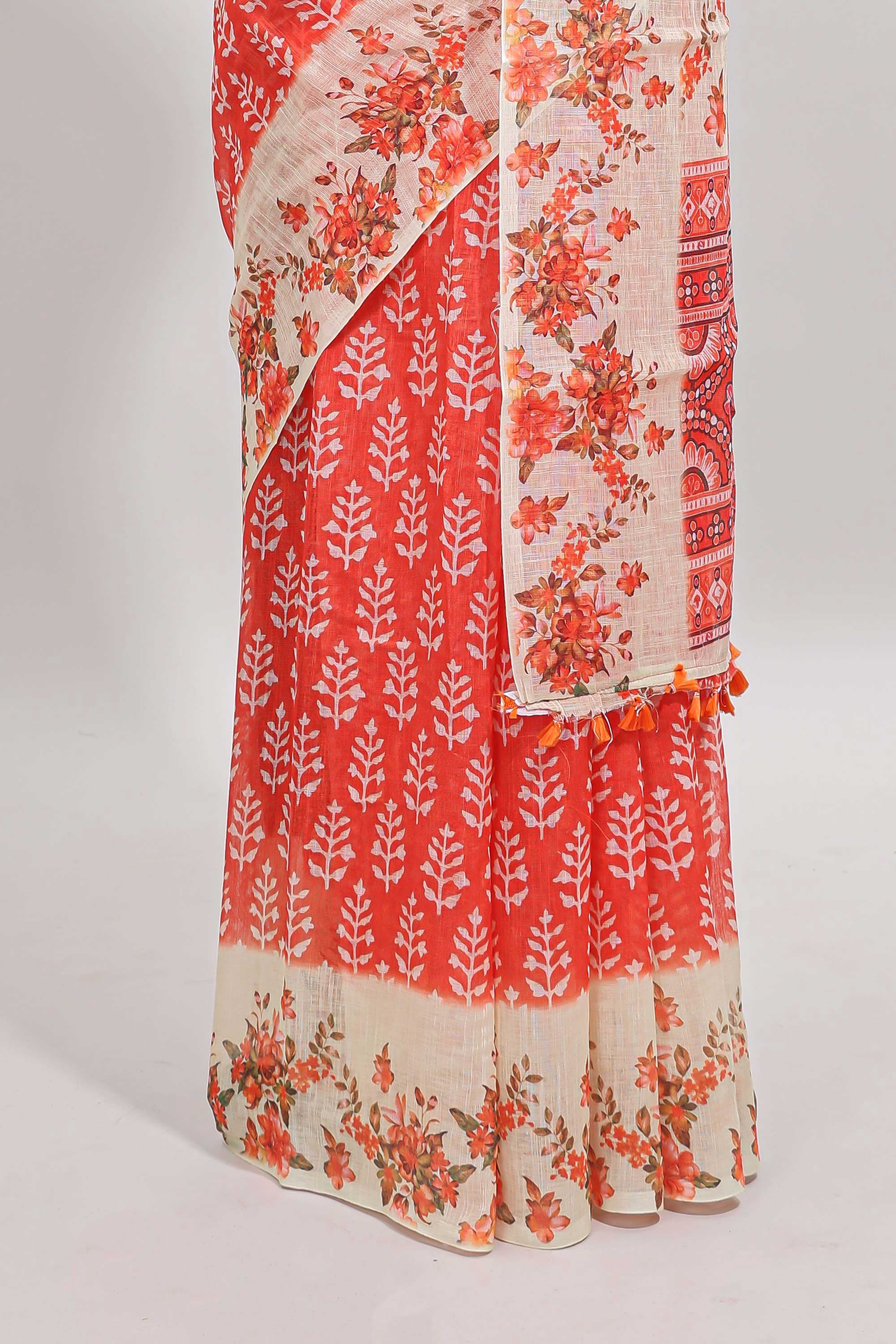 Orange leaf design linen cotton saree with contrast floral design border and matching blouse