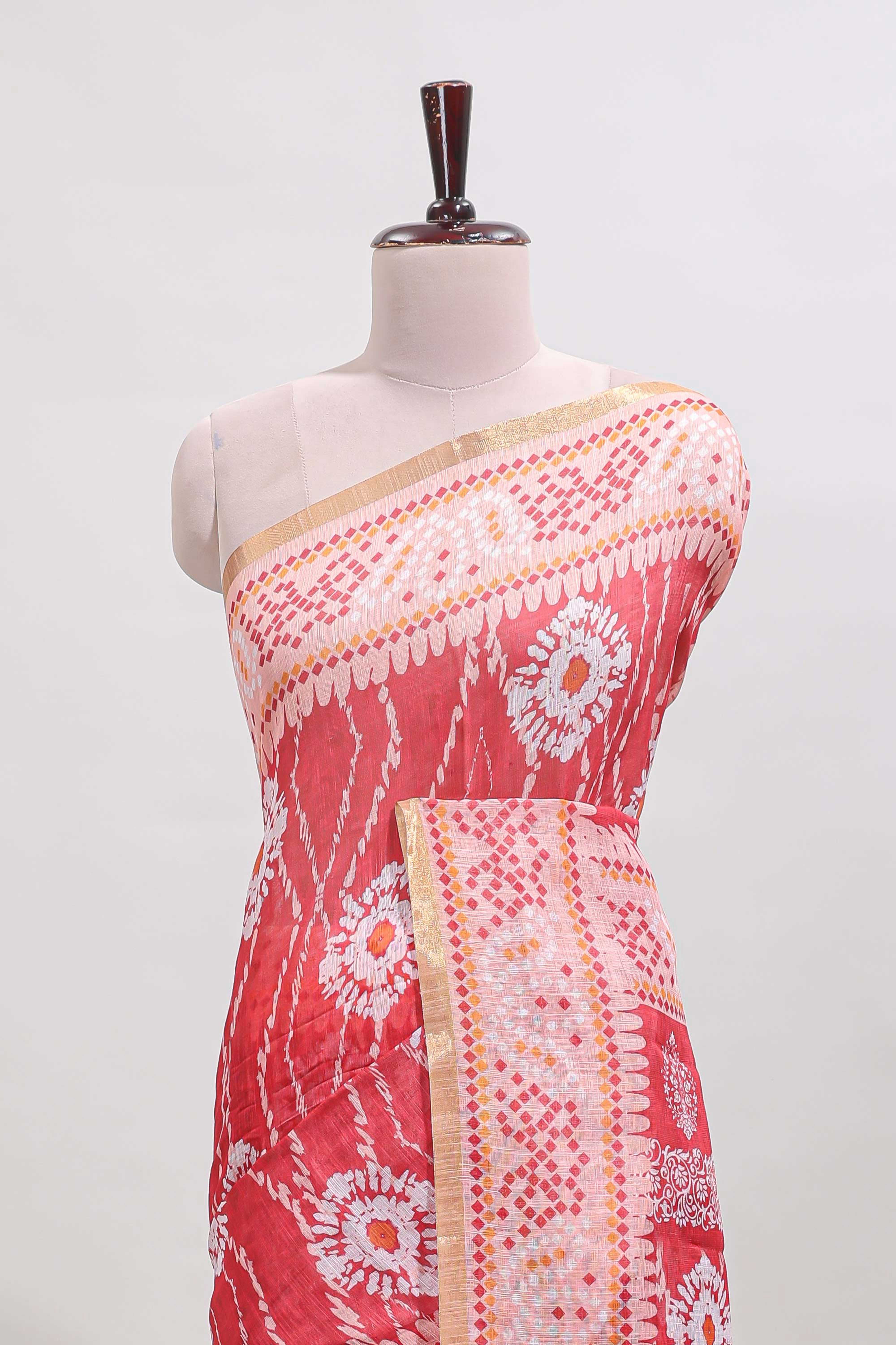 Pink shibori print motifs linen cotton saree with contrast border and matching blouse