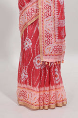 Pink shibori print motifs linen cotton saree with contrast border and matching blouse