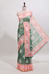 Green shibori print motifs linen cotton saree with contrast border and matching blouse