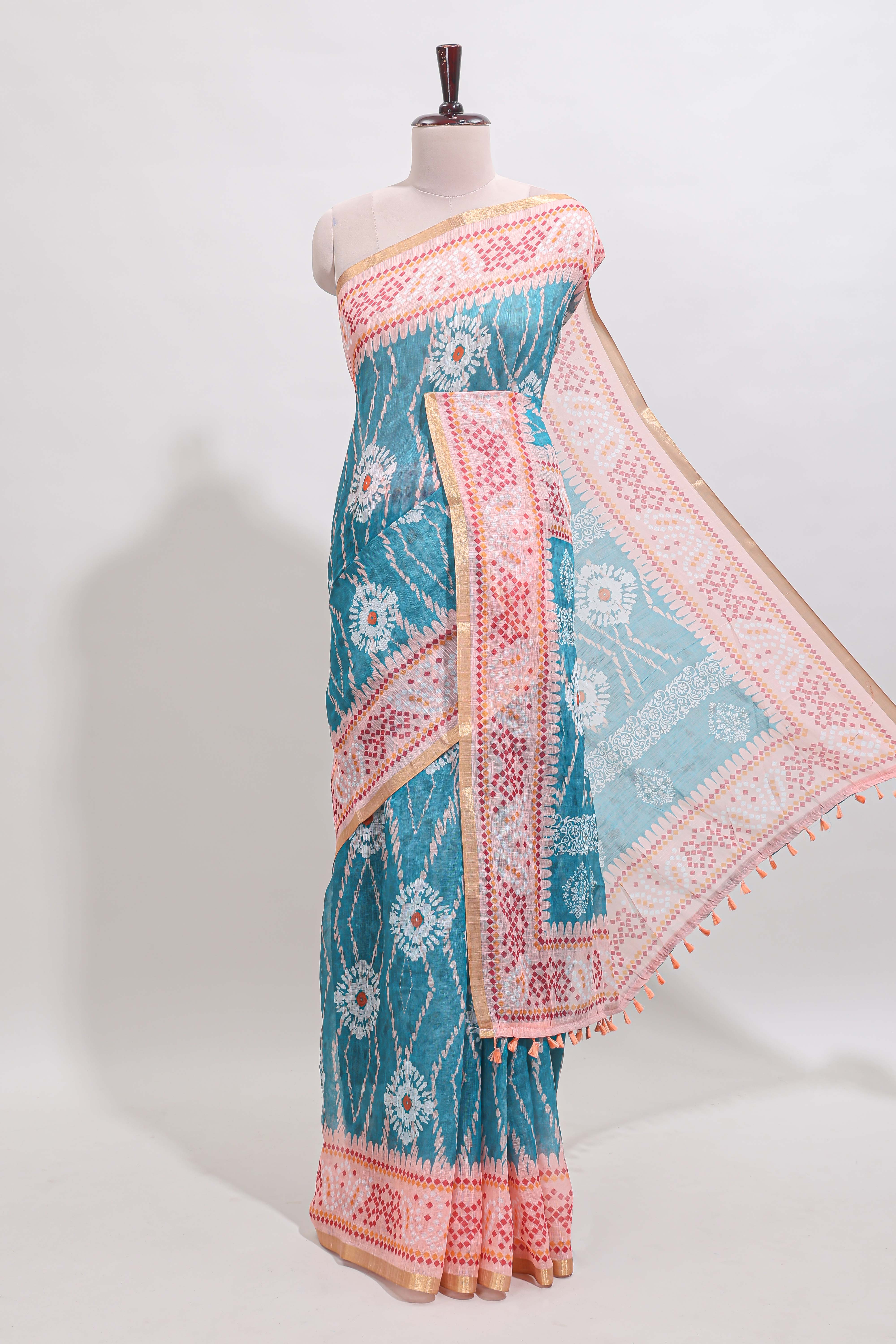 Blue shibori print motifs linen cotton saree with contrast border and matching blouse