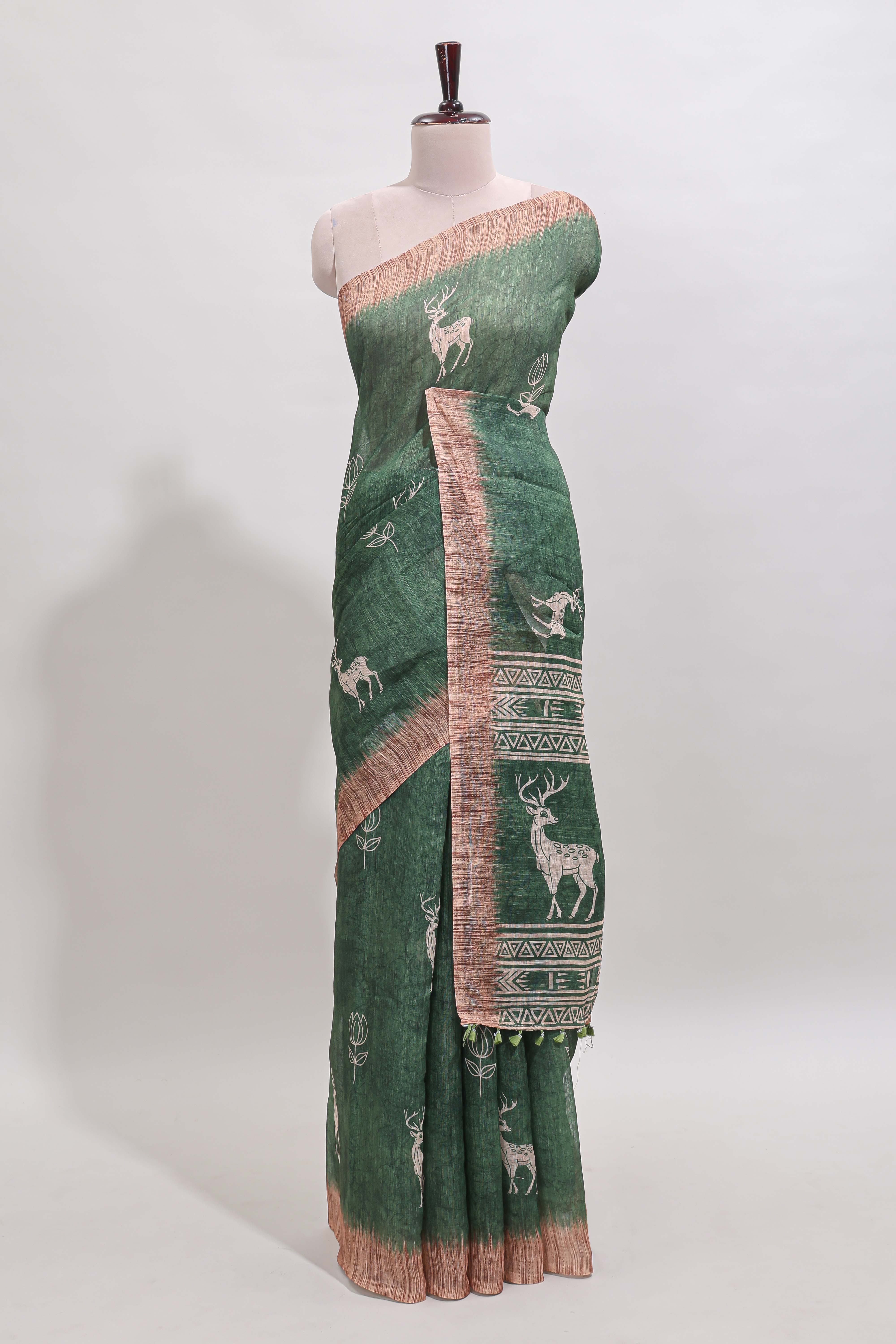 Green floral & deer design motifs linen cotton saree with contrast border and matching printed blouse