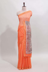 Orange checked geometric design butta linen cotton saree with self zari border and contrast blouse