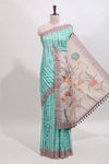 Turquoise green striped digital print linen cotton saree with contrast border and floral design pallu