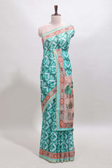 Green geometric digital print linen cotton saree with self zari border and matching blouse