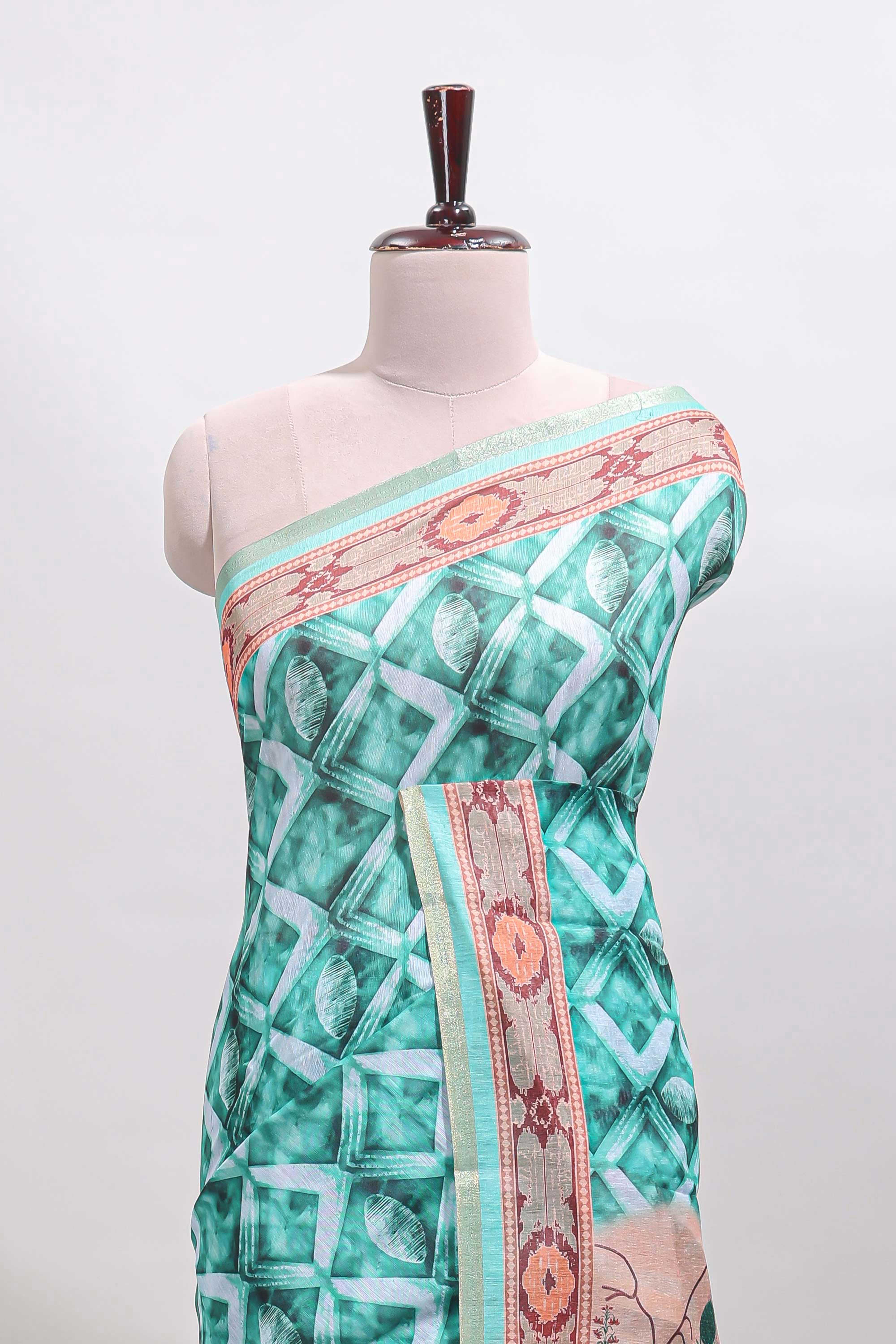 Green geometric digital print linen cotton saree with self zari border and matching blouse