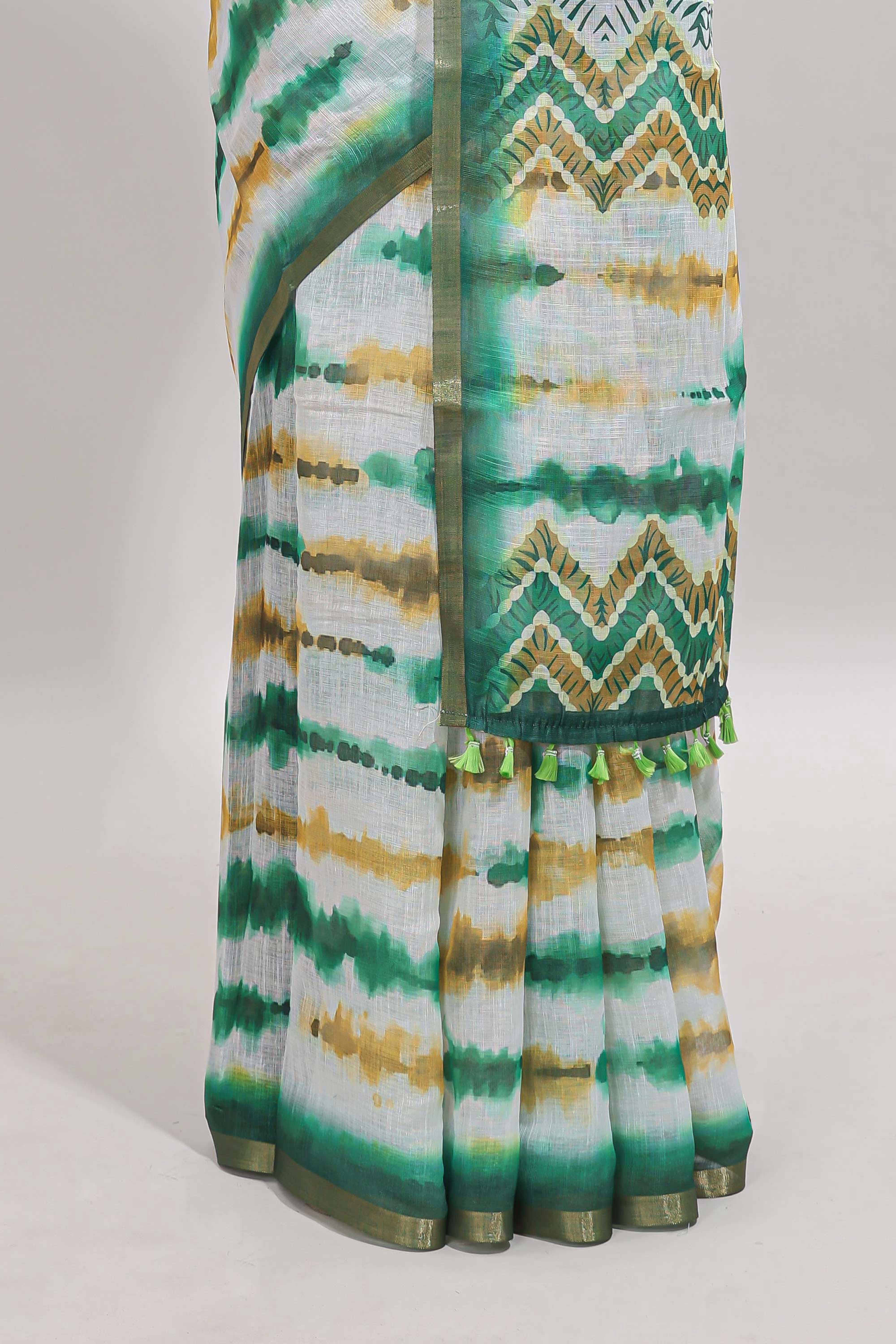 White tie & dye striped linen cotton saree with contrast zari border and printed blouse